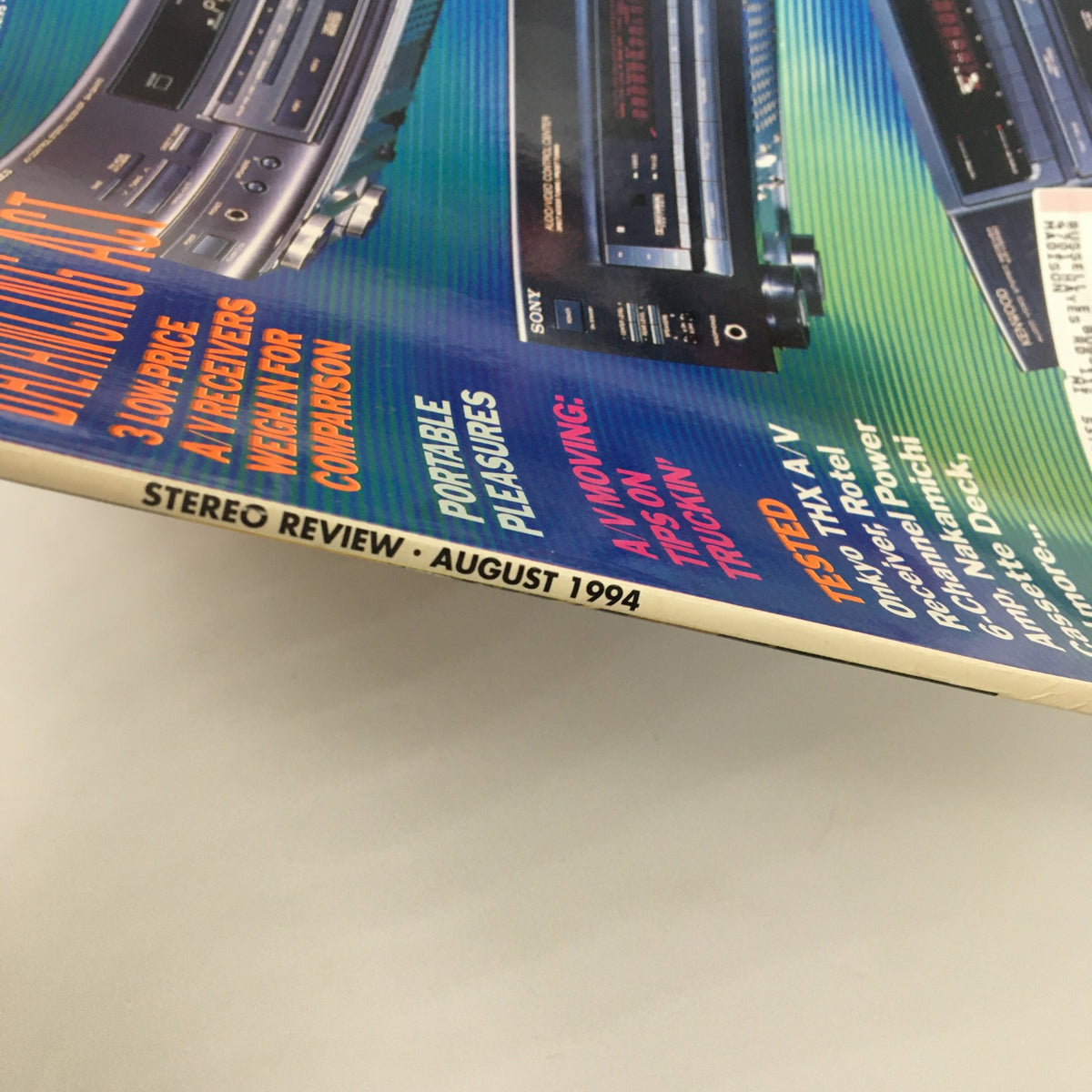 Side view of Stereo Review Magazine August 1994 displaying the publication title and month. Highlights features on A/V receivers and portable pleasures.