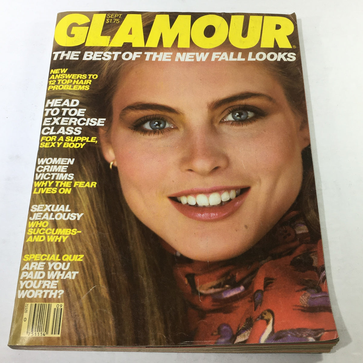 VTG Glamour Magazine: September 1981 cover featuring a smiling model with long hair, showcasing the title 'THE BEST OF THE NEW FALL LOOKS' and highlighting articles on exercise, crime victims, and sexual jealousy.