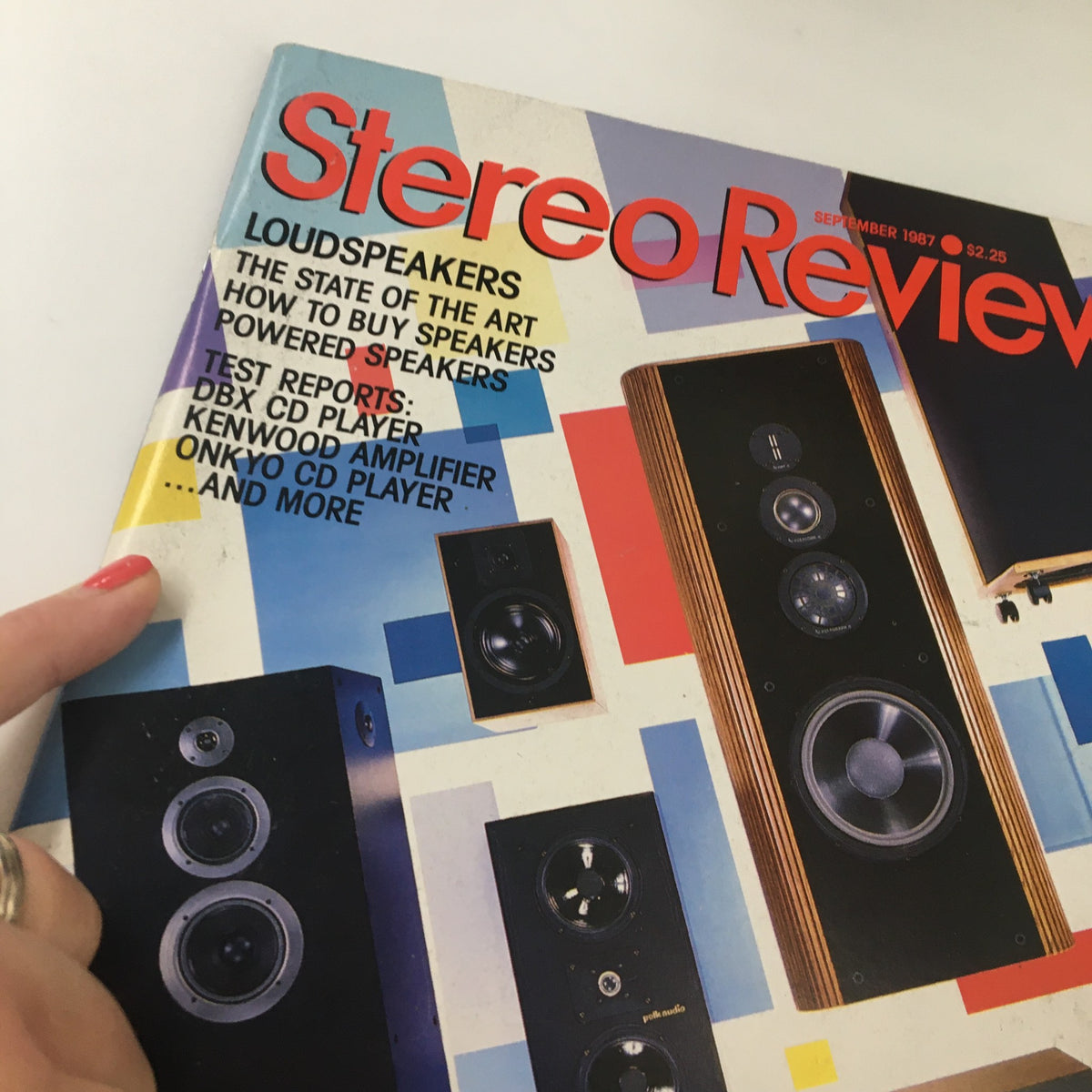 Close-up of the cover of Stereo Review Magazine September 1987, highlighting the articles on loudspeakers and audio equipment including Design Acoustics PS-103 and Klipsch KG2.