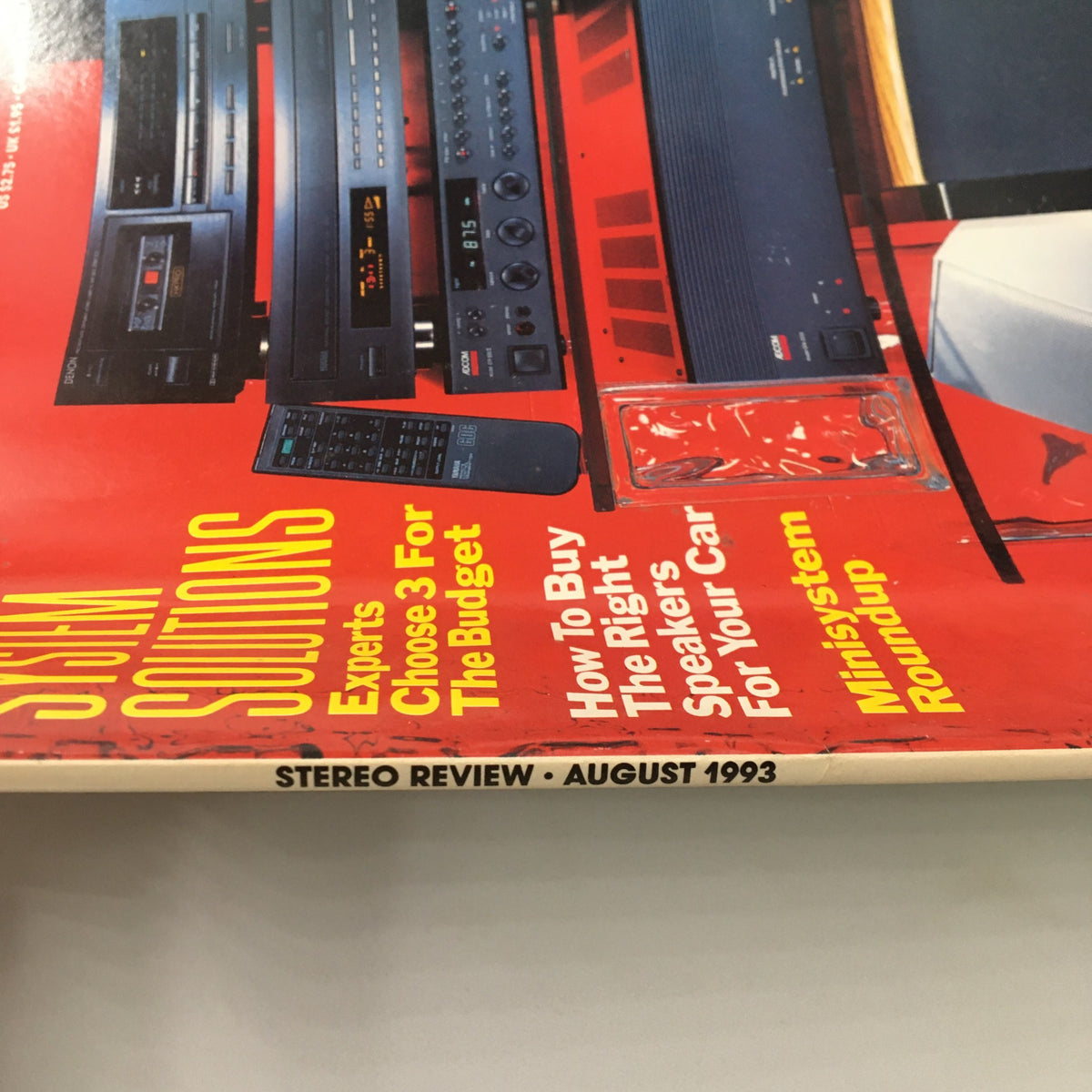 Stereo Review Magazine August 1993 featuring Adcom GTP-500II Tuner/Preamp and GFA-2535, showcasing high-fidelity audio equipment and reviews. The magazine cover displays a vibrant red background with a focus on audio solutions, including expert recommendations for budget systems.