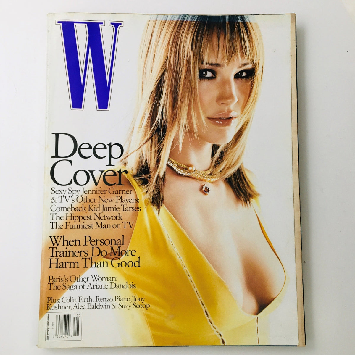 W Magazine November 2003 cover featuring American actress Jennifer Garner in a stylish pose, highlighting her fashion from the early 2000s.