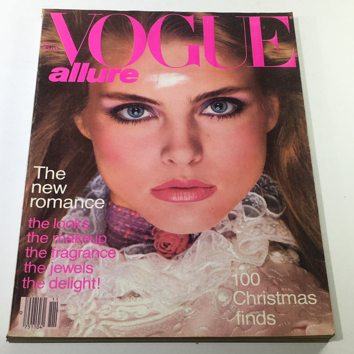 VTG Vogue Magazine: November 1980 featuring Kim Alexis on the cover, showcasing vibrant makeup and fashion of the era.