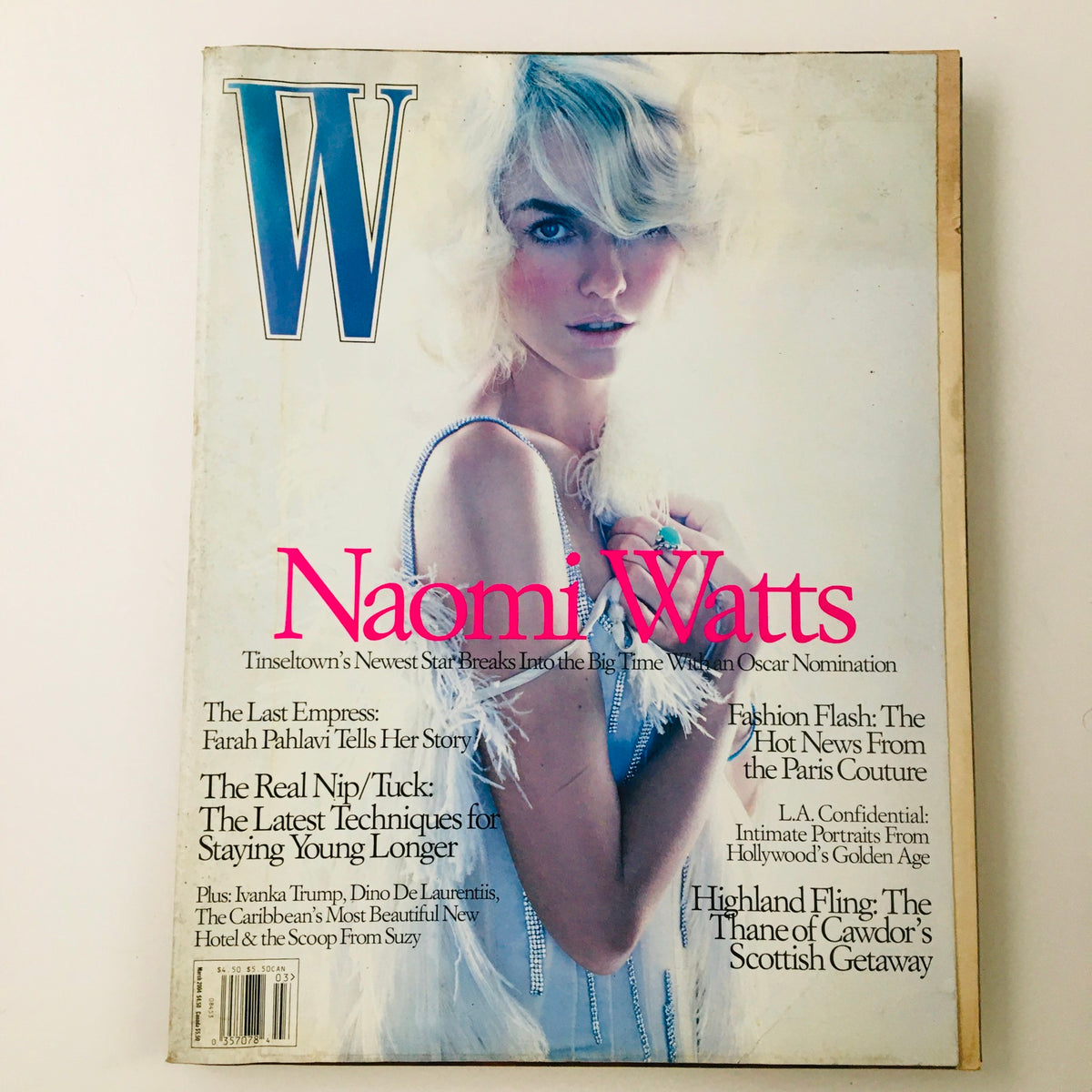 W Magazine March 2004 featuring Naomi Watts on the cover, showcasing her as Tinseltown's newest star with an elegant look.