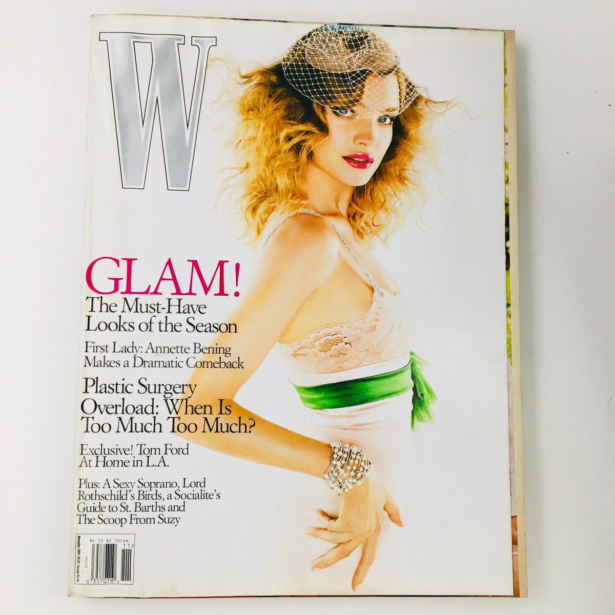 W Magazine November 2004 cover featuring Russian model Natalia Vodianova showcasing glamour fashion. The cover highlights the must-have looks of the season, with insight on plastic surgery and exclusive content from Tom Ford.