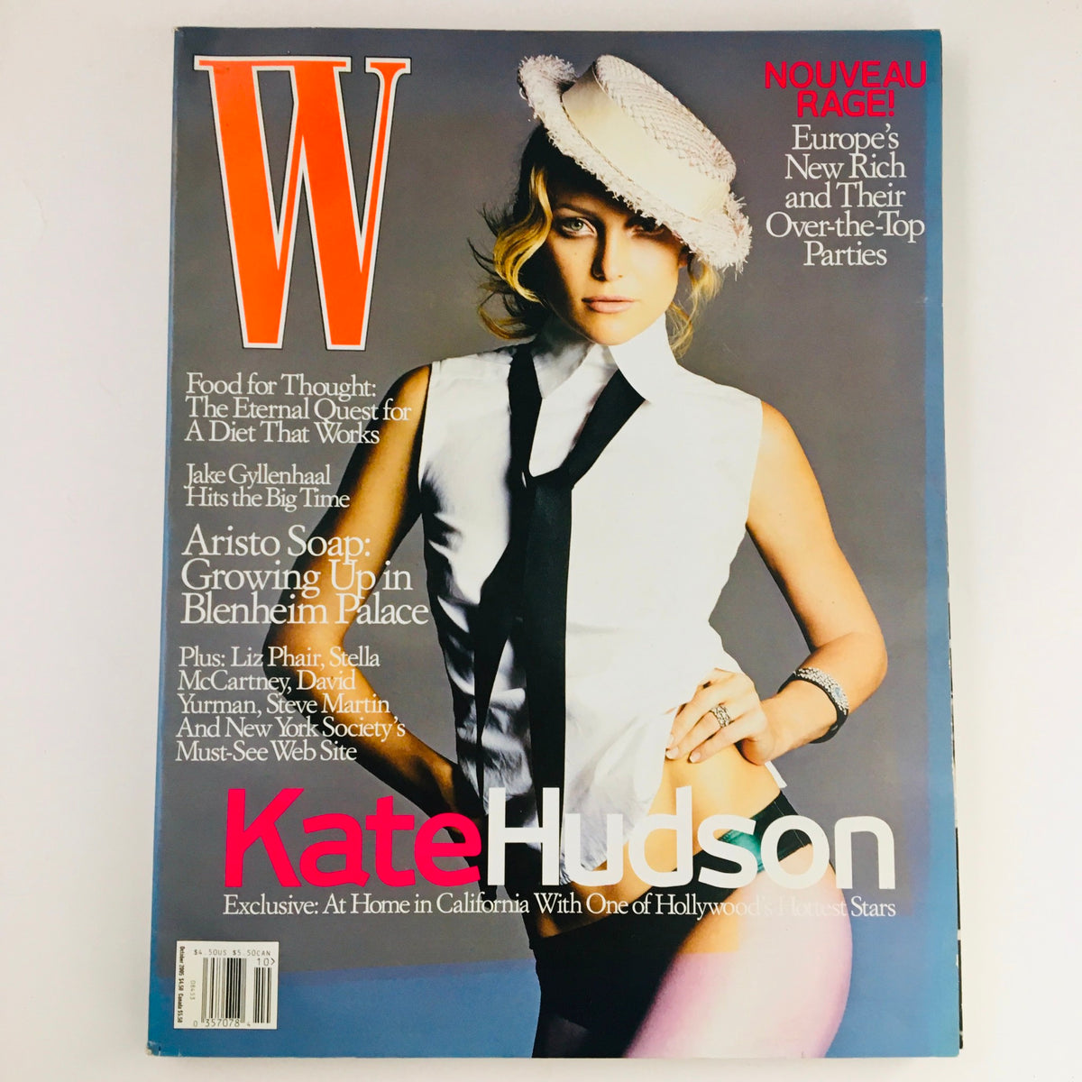 W Magazine cover from October 2005 featuring actress Kate Hudson with a stylish hat, in a striking black and white outfit. This issue highlights Kate Hudson and Jake Gyllenhaal, perfect for collectors of vintage Hollywood magazines.