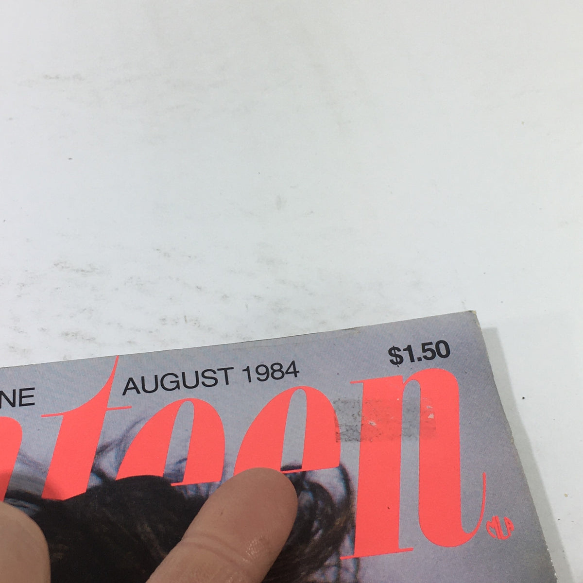 Close-up view of the top section of VTG Seventeen Magazine: August 1984, displaying the title, date, and price, with visible wear showing its vintage nature.
