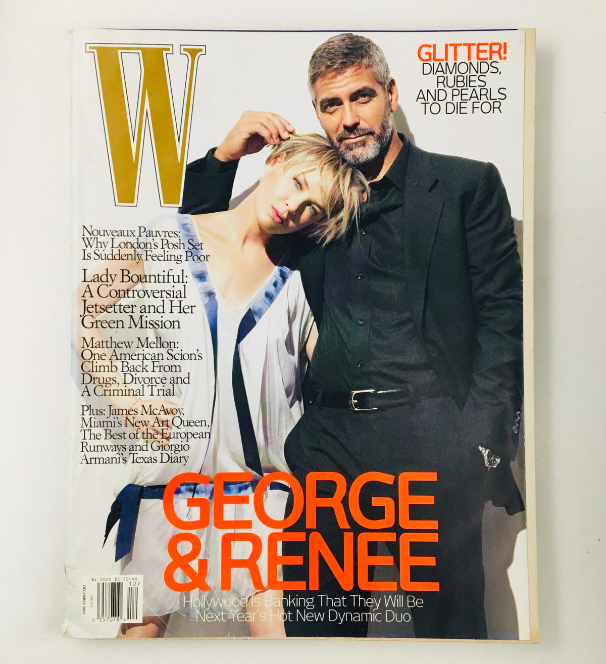 W Magazine December 2007 featuring George Clooney and Renée Zellweger on the cover, showcasing a blend of celebrity glamour and pop culture from the late 2000s.