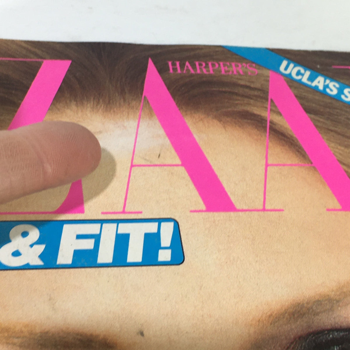 Close-up of the VTG Bazaar Magazine: April 1981 cover, showing a finger pointing at the magazine title which emphasizes 'BEAUTIFUL & FIT!'