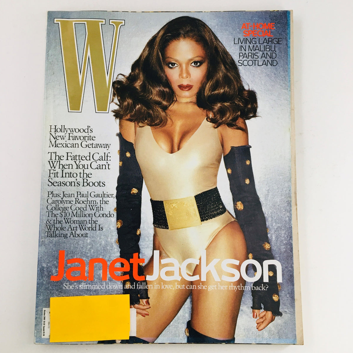 W Magazine October 2006 cover featuring singer-songwriter Janet Jackson, showcasing her in a fashionable outfit. The cover highlights themes of love and personal reflection, with a focus on her influence in music and culture.