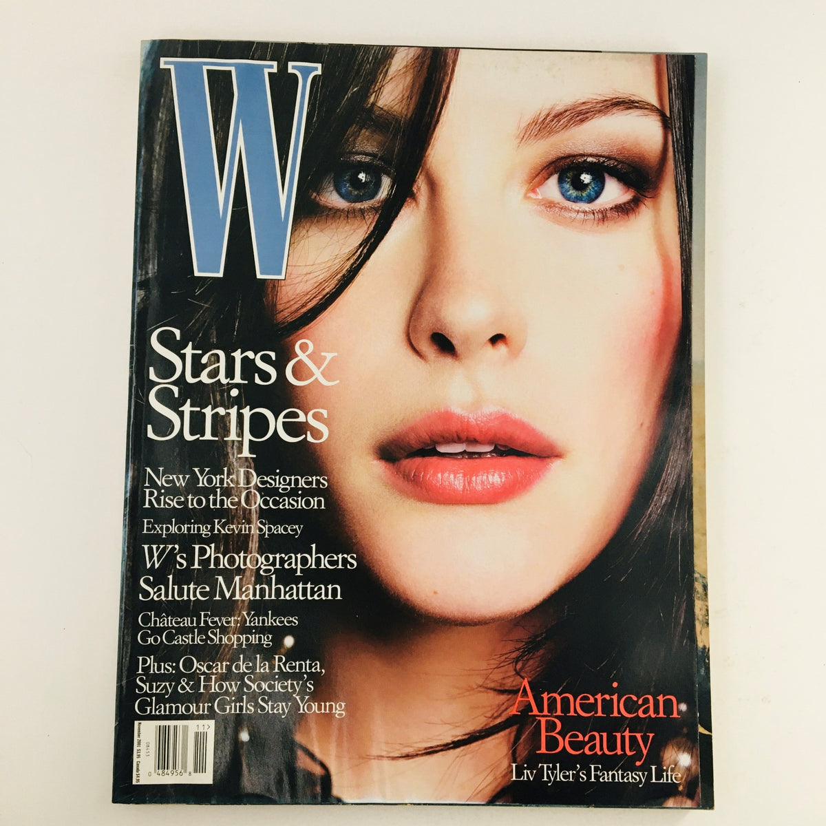 W Magazine November 2001 cover featuring actress Liv Tyler, highlighting her American beauty and fantasy life.