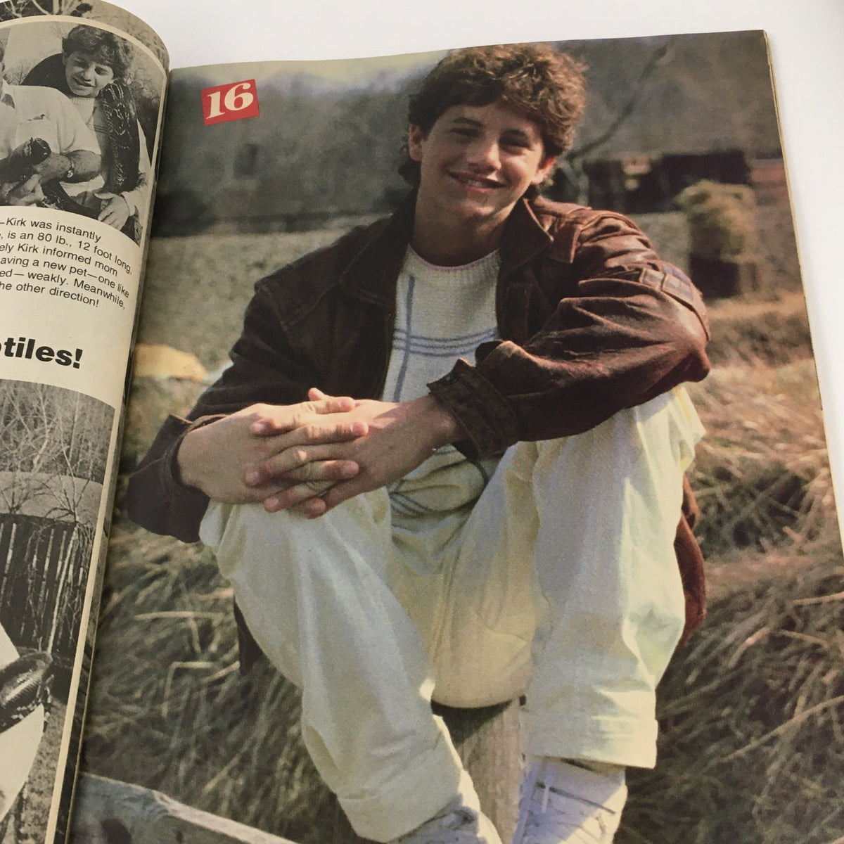 16 Magazine August 1986 featuring a young male celebrity, casually dressed, sitting outdoors smiling, capturing the essence of 80s youth culture.