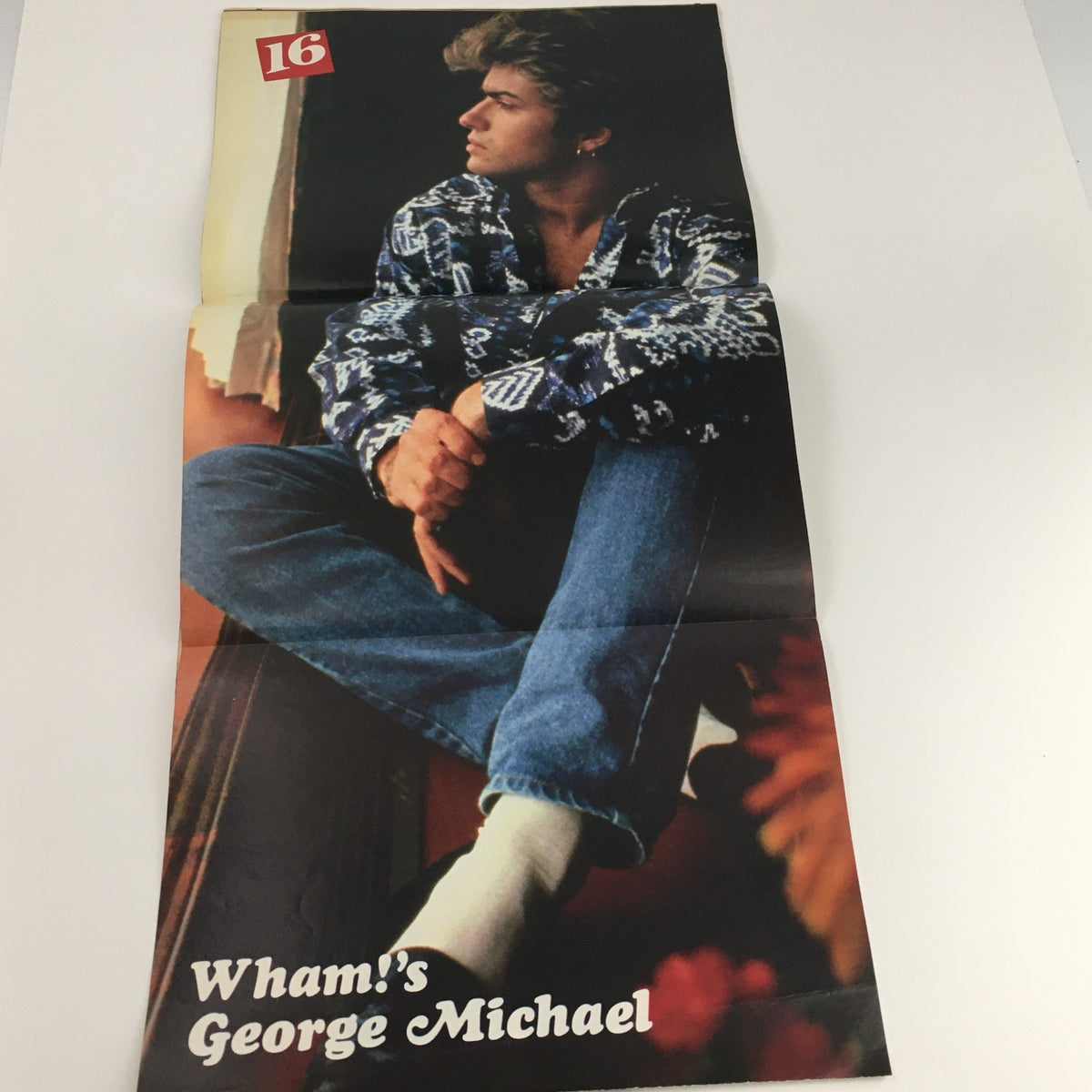 16 Magazine August 1986 edition featuring Wham!'s George Michael posed pensively, highlighting his iconic style from the 80s.