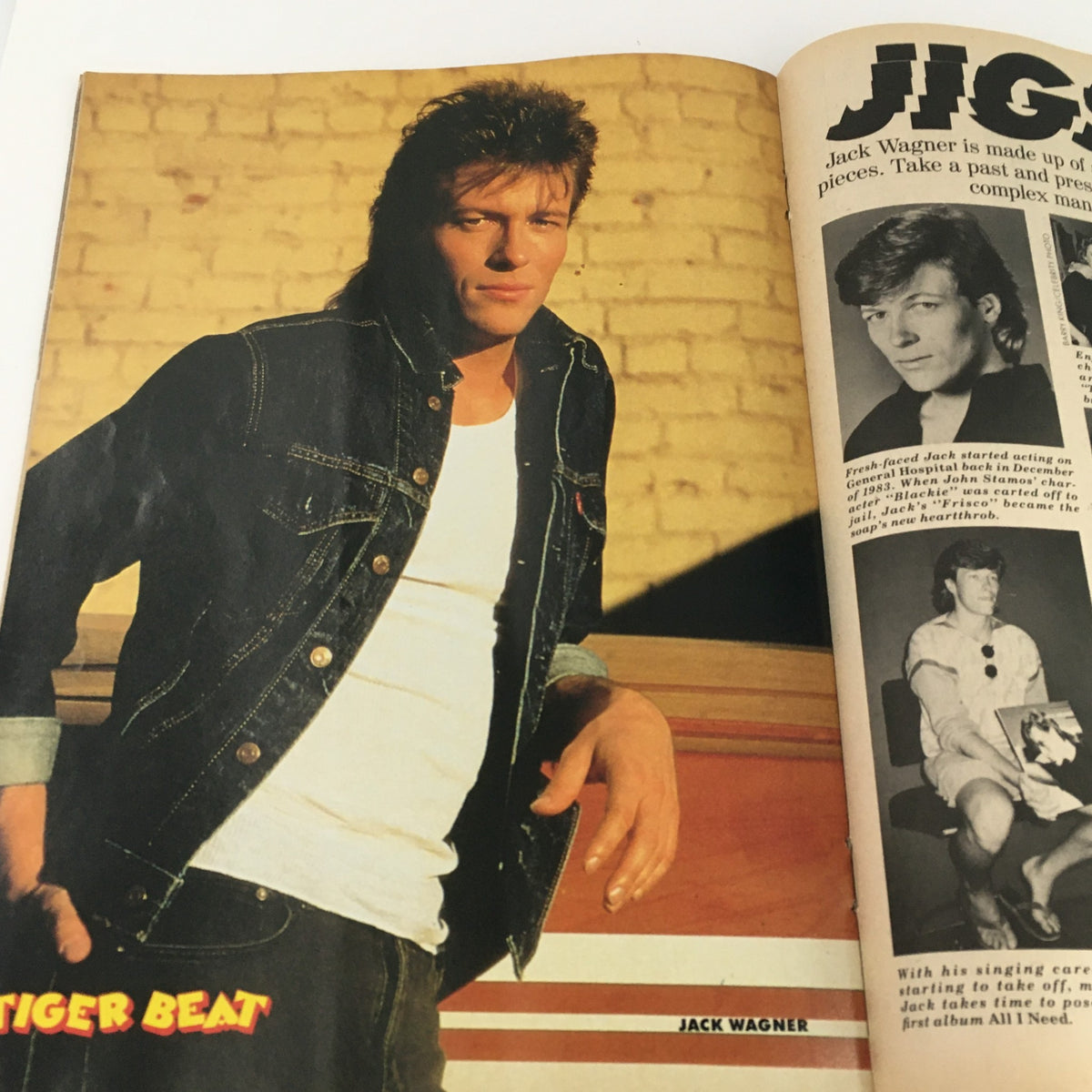 Vintage photo of Jack Wagner featured in Tigers Beat Magazine October 1986, showcasing 80s fashion with denim jacket and white shirt.