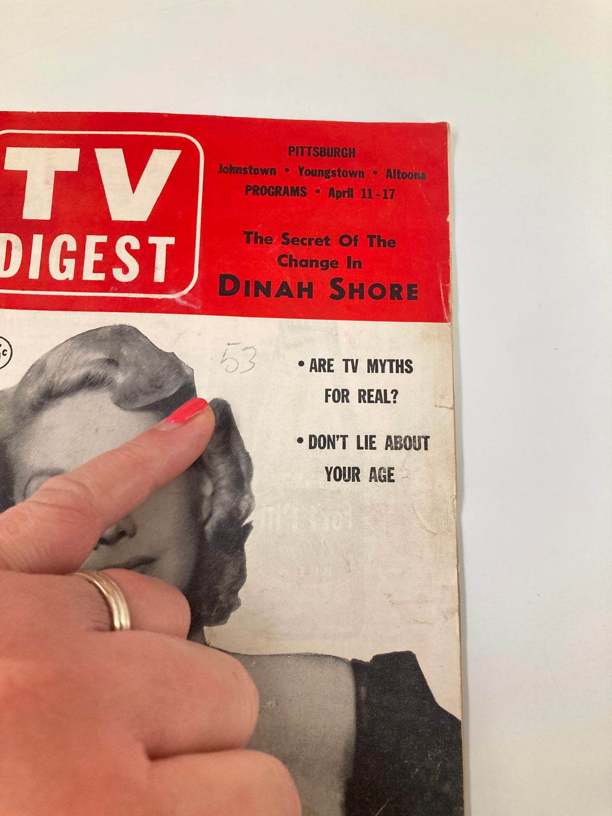 Close-up of TV Digest Magazine April 11 1953 cover with Dinah Shore, highlighting intriguing article titles and a classic layout.