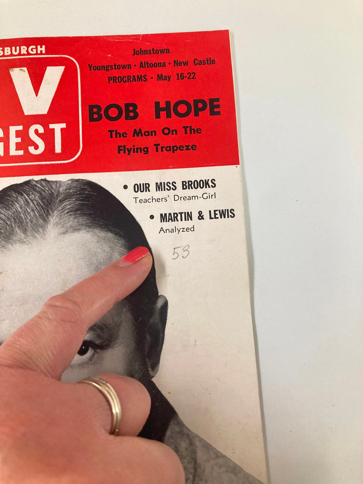 Close-up of the TV Digest Magazine cover from May 16, 1953, highlighting Bob Hope and additional features like 'OUR MISS BROOKS' and 'MARTIN & LEWIS,' with a finger pointing at the corner.