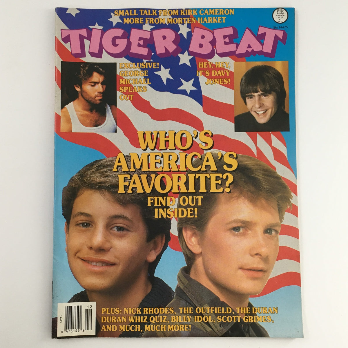 Tiger Beat Magazine December 1986 featuring George Michael and Davy Jones on the cover, with bold text announcing 'Who's America's Favorite?' and vibrant background design. A collectible vintage magazine showcasing notable pop icons from the 1980s.