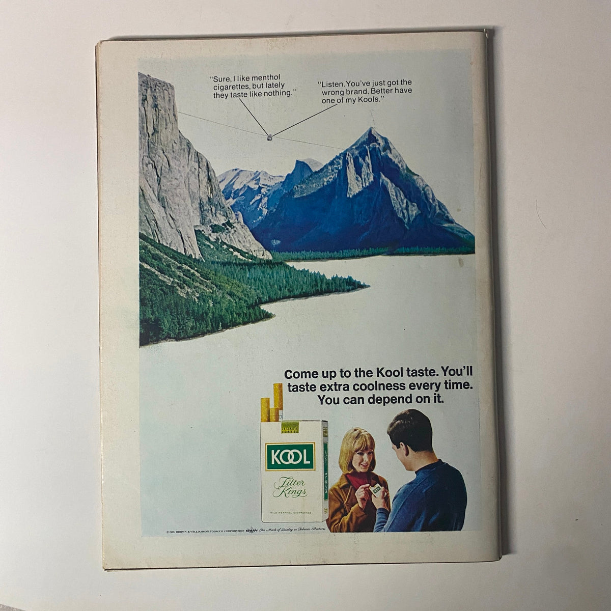 Back cover of Time Magazine November 3, 1967 Vol 90 No. 18, advertising Kool menthol cigarettes with scenic landscape and two people discussing.