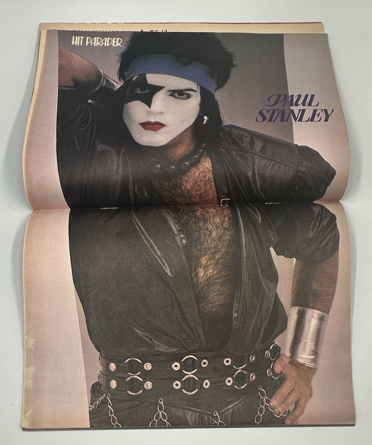 Centerfold of Hit Parader Magazine June 1982 featuring Paul Stanley of Kiss, dressed in rock attire and makeup.