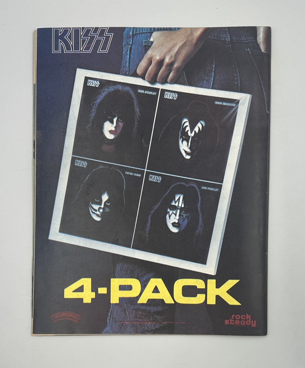 Cover of Hit Parader Magazine February 1979 featuring Gene Simmons from KISS and Black Sabbath. The design includes a '4-Pack' feature showcasing iconic band members with bold colors and imagery, capturing the rock music culture of the era.
