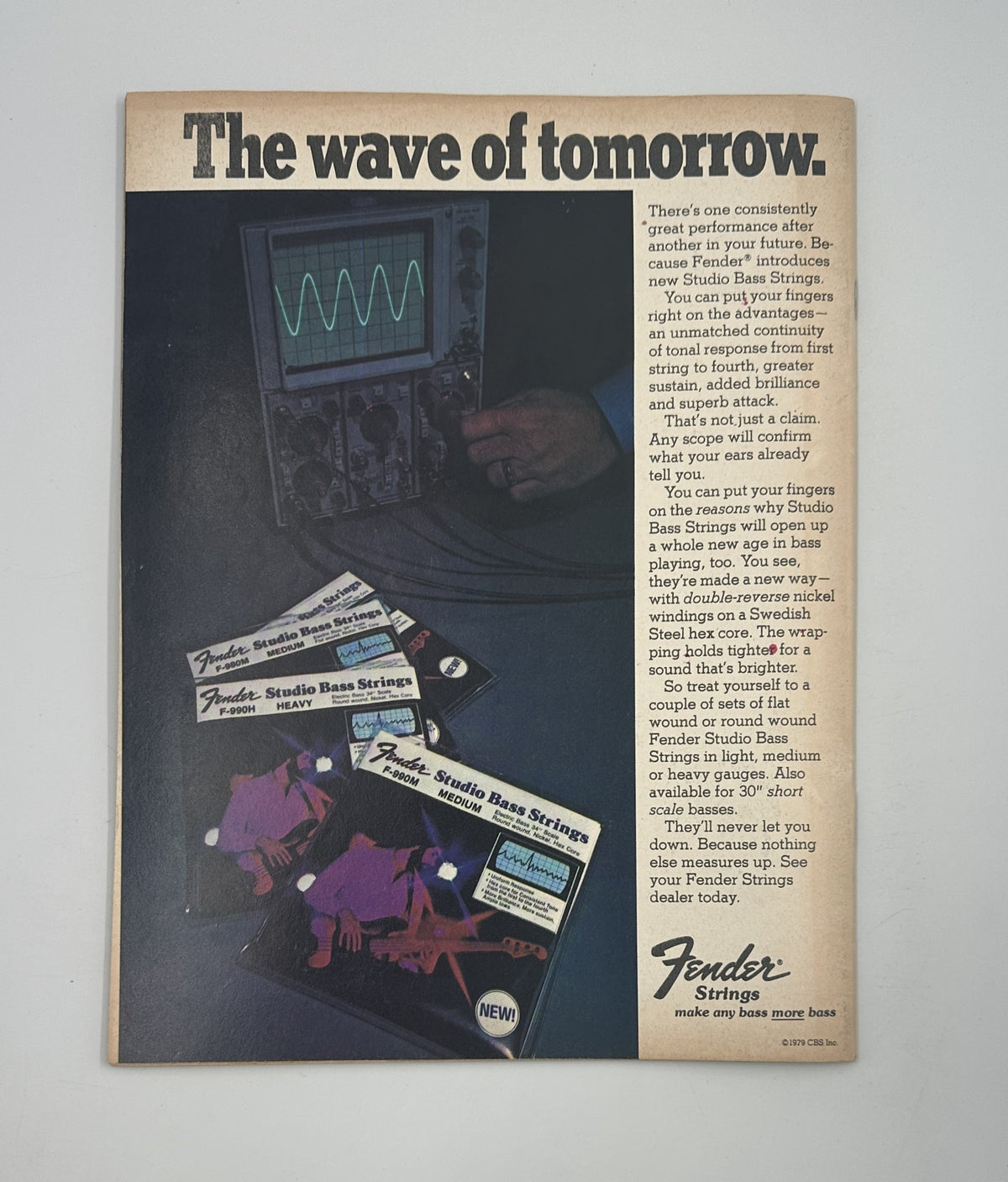 Advertisement from Hit Parader Magazine September 1979 promoting Fender Strings, featuring a futuristic display of bass guitar strings and equipment.