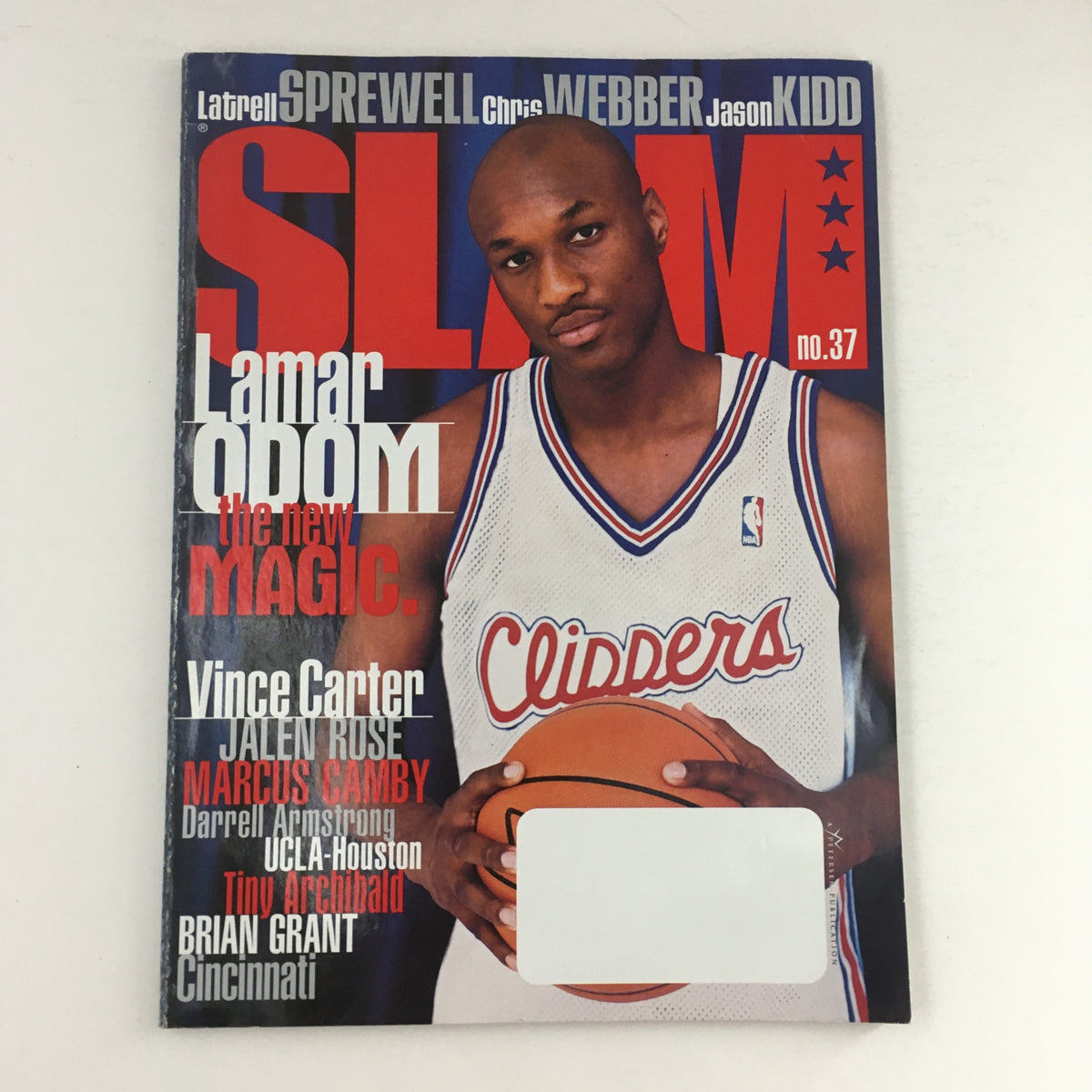 Slam Magazine 1999 Vol 6 #7 features NBA players Lamar Odom and Vince Carter on the cover, showcasing a vintage basketball collectible.