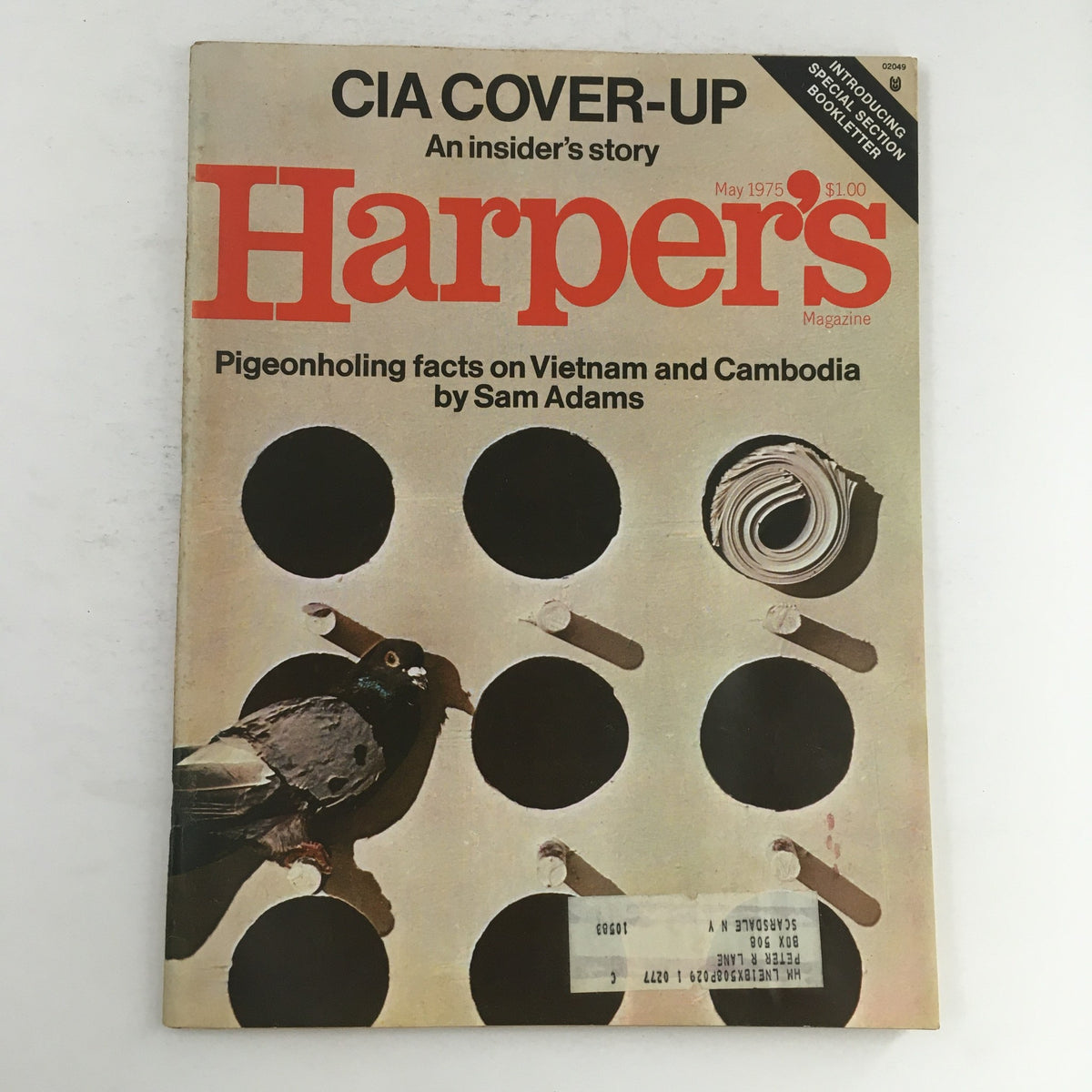 Cover of Harper's Magazine May 1975, featuring the headline 'CIA Cover-Up: An Insider's Story' and an article titled 'Pigeonholing Facts on Vietnam and Cambodia by Sam Adams.' The cover includes a visual depiction of a pigeon and bullet holes.