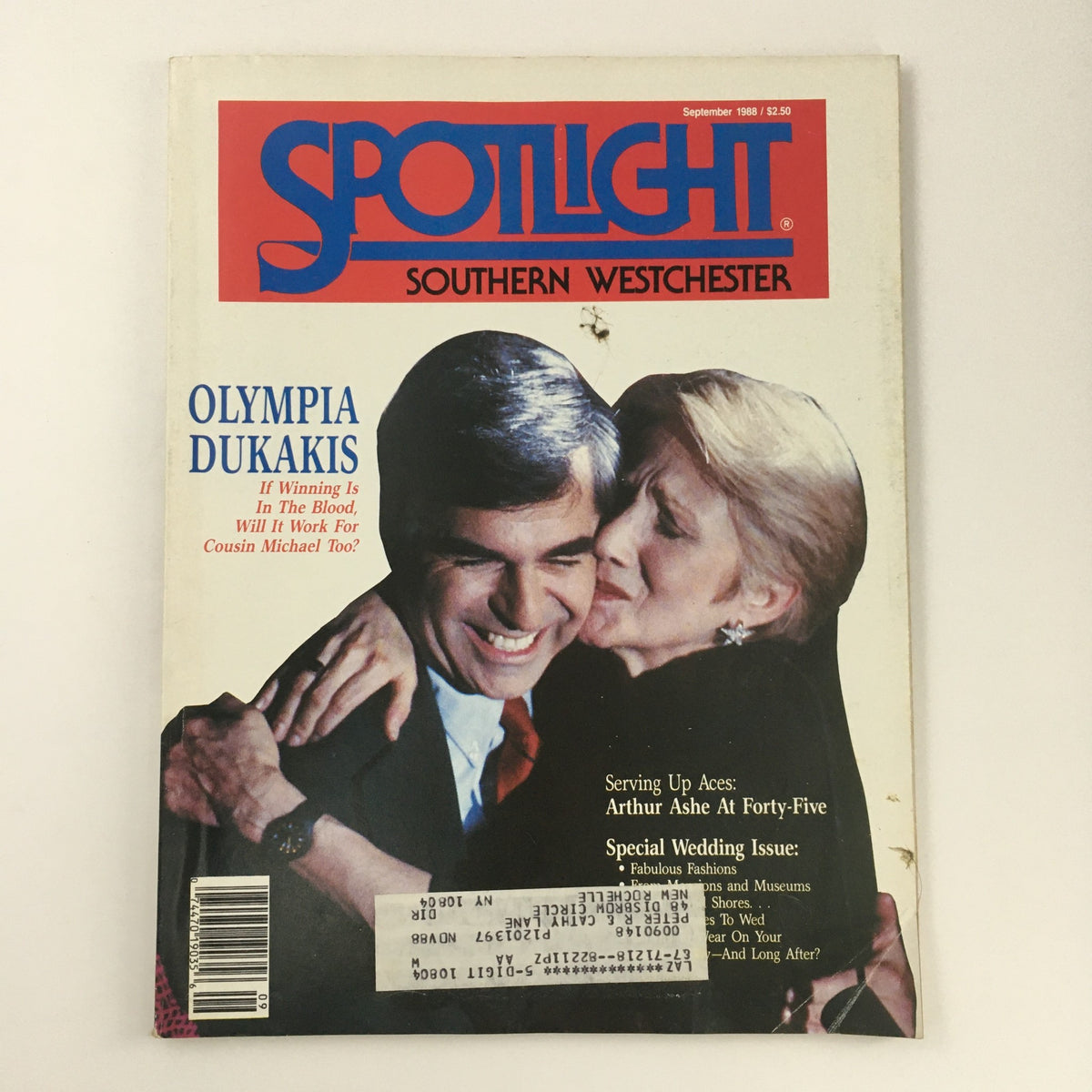 Cover of Spotlight Magazine from September 1988 featuring actress Olympia Dukakis. The magazine highlights the theme 'If Winning Is In The Blood, Will It Work For Cousin Michael Too?' accompanied by an image of Dukakis in an intimate pose with a man, along with articles on various topics.