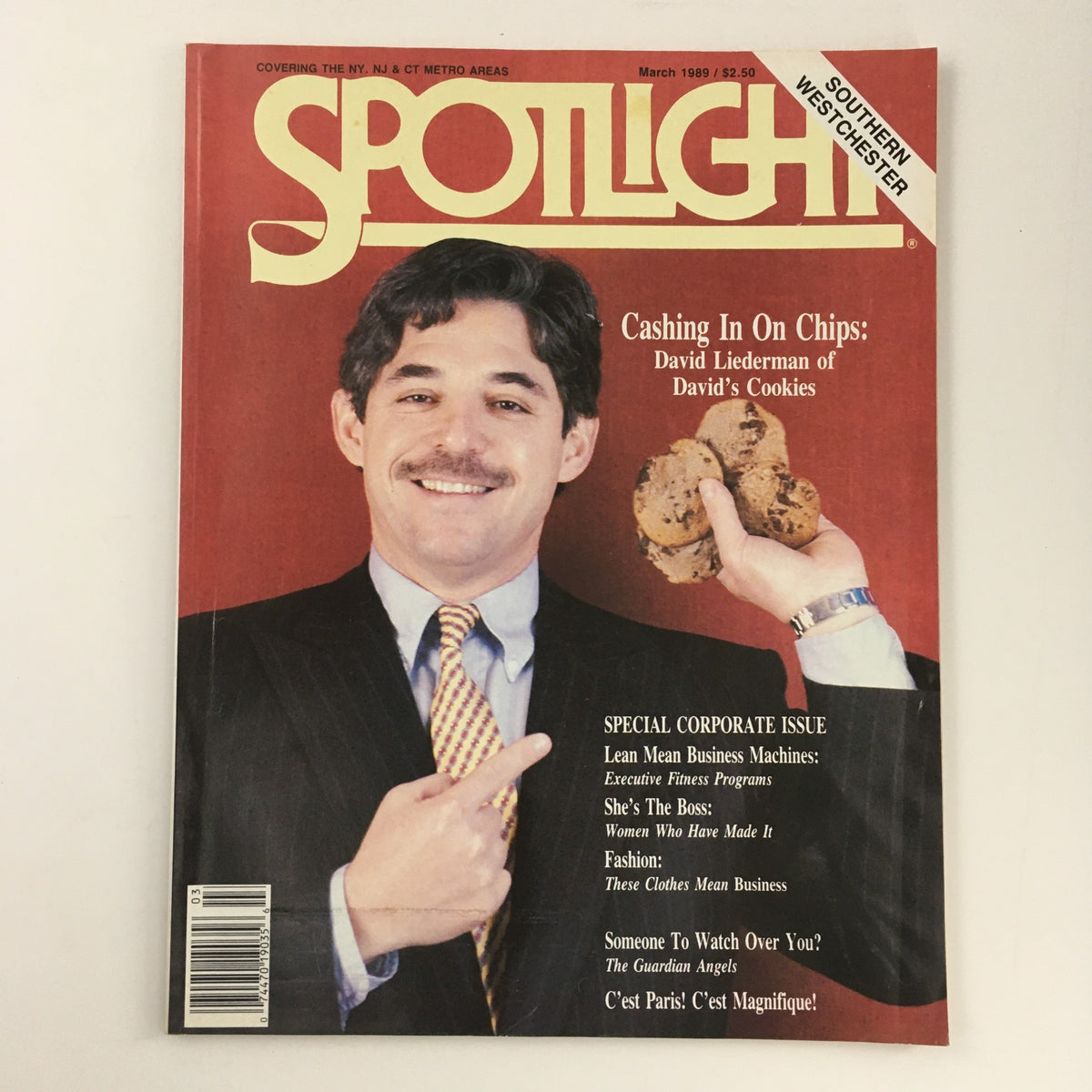 Spotlight Magazine March 1989 cover featuring David Liederman of David's Cookies, showcasing him holding chocolate chip cookies with a smile. Perfect for collectors of vintage food magazines.