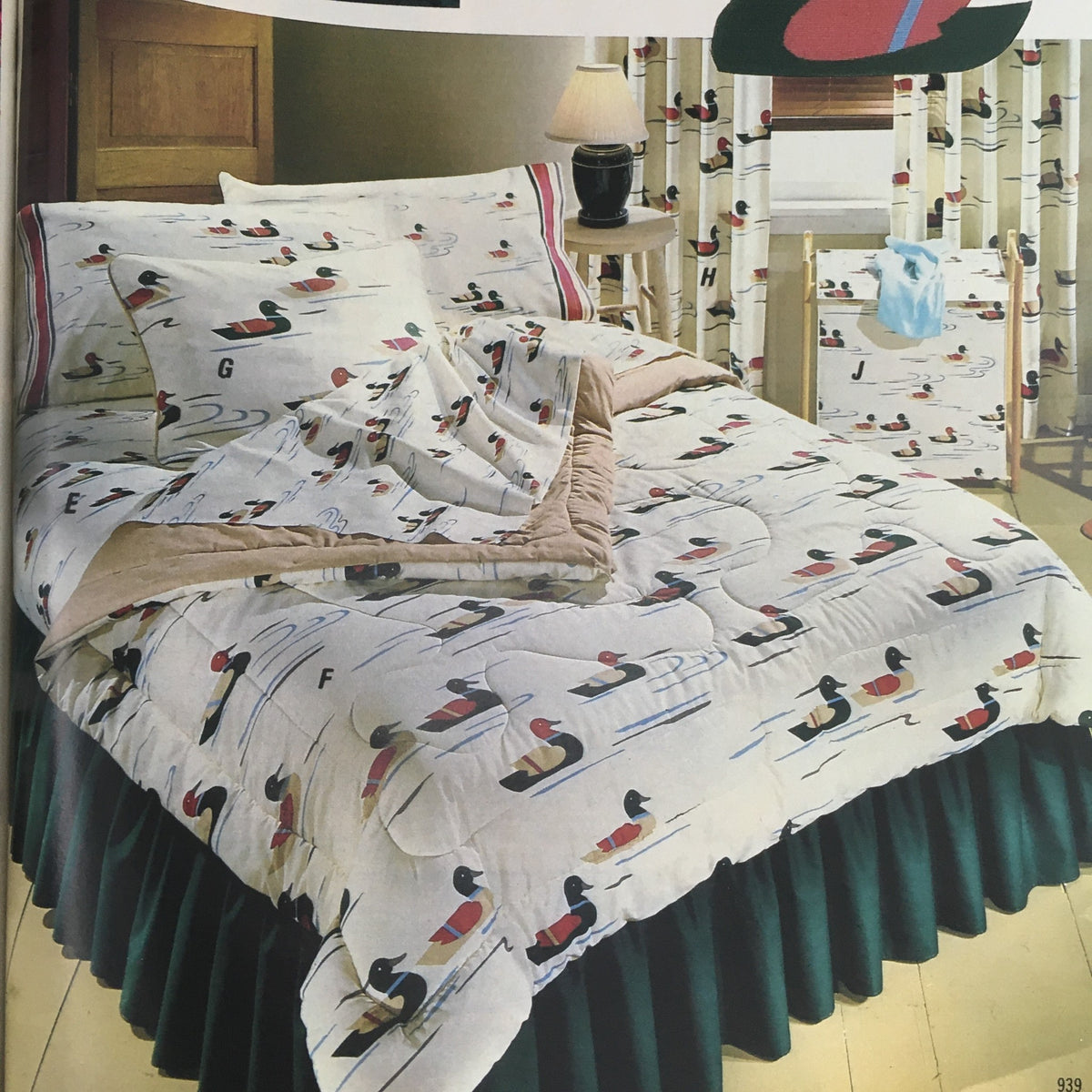 Sears Fashion Apparel Sears Centennial 1976 Celebrating Sears catalog image of a cozy bedding set featuring a playful duck pattern, complete with quilt and pillows, perfect for home decoration.