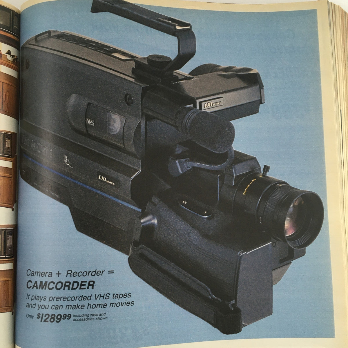 Sears Fashion Apparel Sears Centennial 1976 Celebrating Sears catalog image showcasing a vintage camcorder designed for recording VHS tapes, emphasizing video technology from the late 20th century.