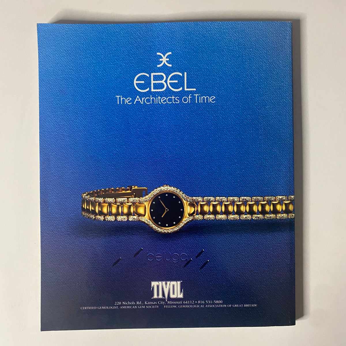 Connoisseur Magazine May 1988 Luxury Lingerie showcasing Ebel watch advertisement on a blue background.