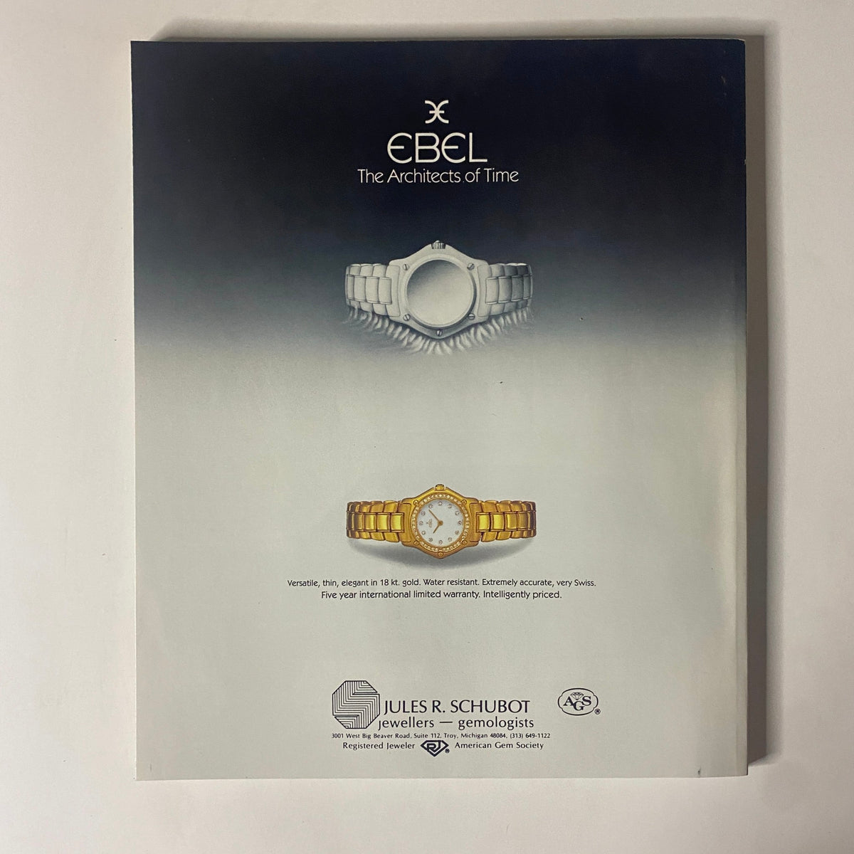 Back cover of Connoisseur Magazine December 1988 displaying an advertisement for Ebel watches. Highlighting luxury timepieces with a minimalist design in an elegant presentation.