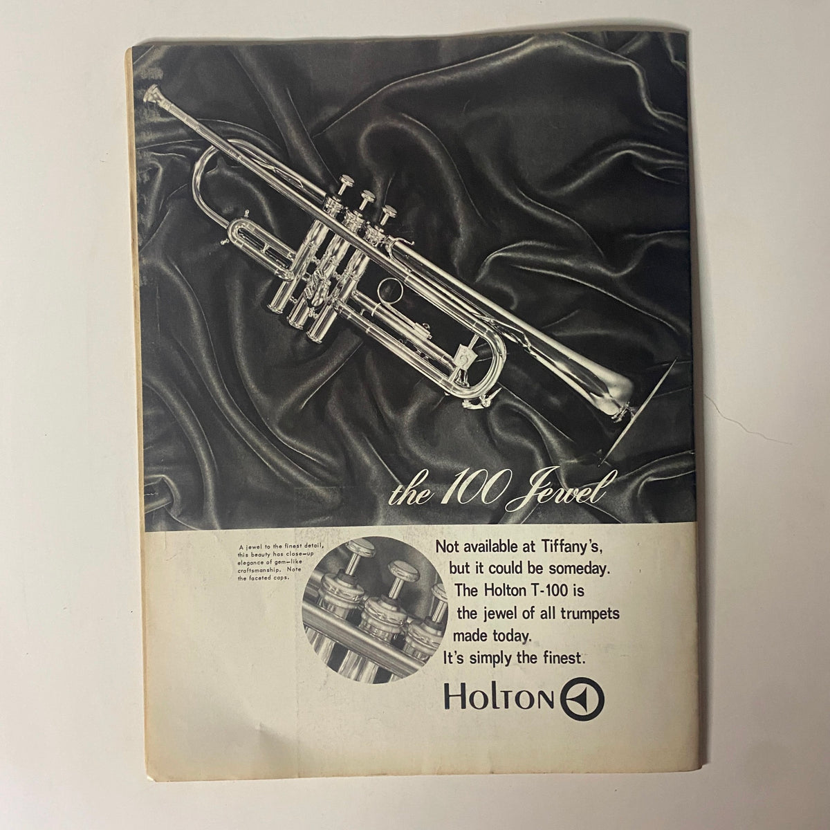 Vintage advertisement for Holton T-100 trumpet featured in Down Beat Magazine September 19, 1968, highlighting its status as the jewel of all trumpets.