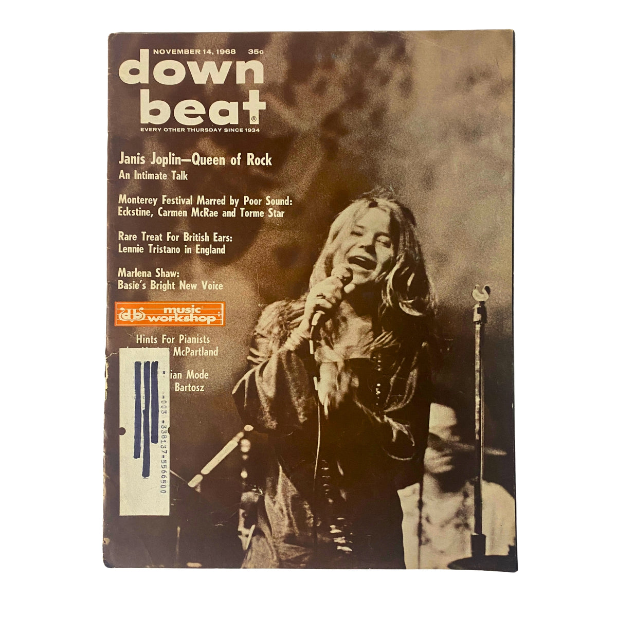 Cover of Down Beat Magazine November 14, 1968, featuring Janis Joplin, titled 'Queen of Rock.' The cover showcases Janis Joplin performing passionately, emphasizing her role in rock music.