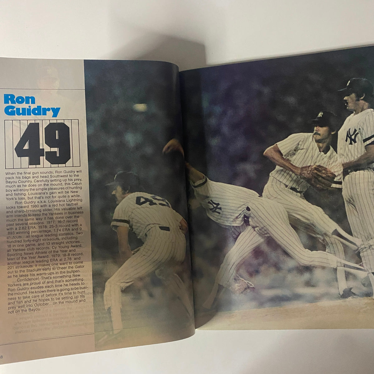 Ron Guidry player profile page from the 1980 New York Yankees Yearbook 'Dawning of a Decade', highlighting his biography and career.