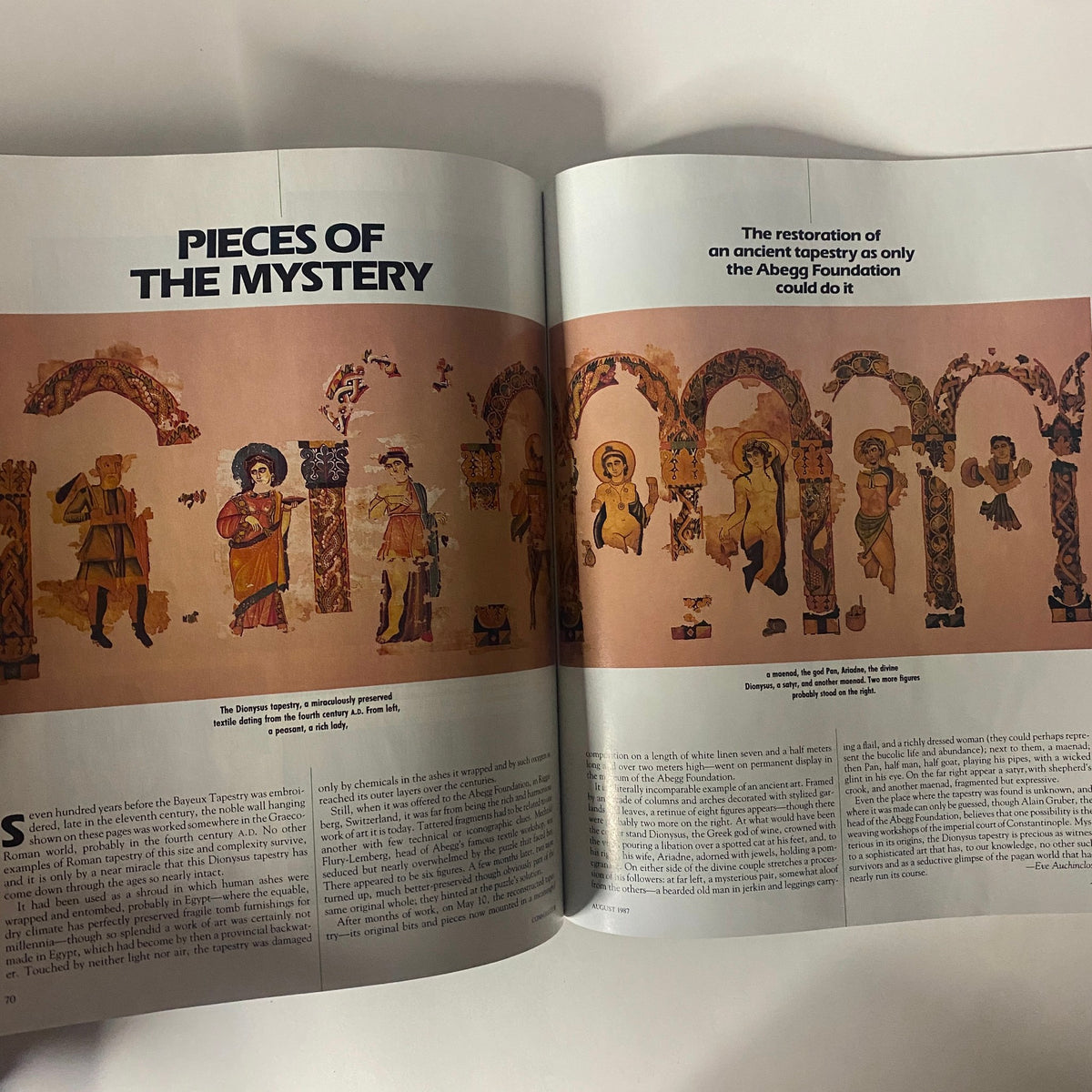 Inside spread of Connoisseur Magazine August 1987 showcasing an article titled 'Pieces of the Mystery' discussing the restoration of an ancient tapestry.