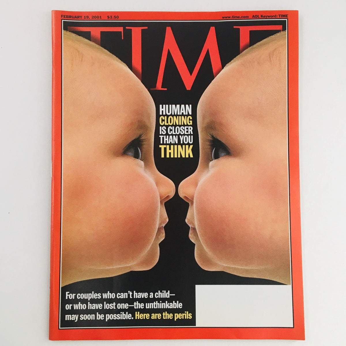 Cover of Time Magazine from February 19, 2001, titled 'Human Cloning Is Closer Than You Think', featuring the faces of two babies side by side, representing the ethical and scientific discussions around cloning technology.