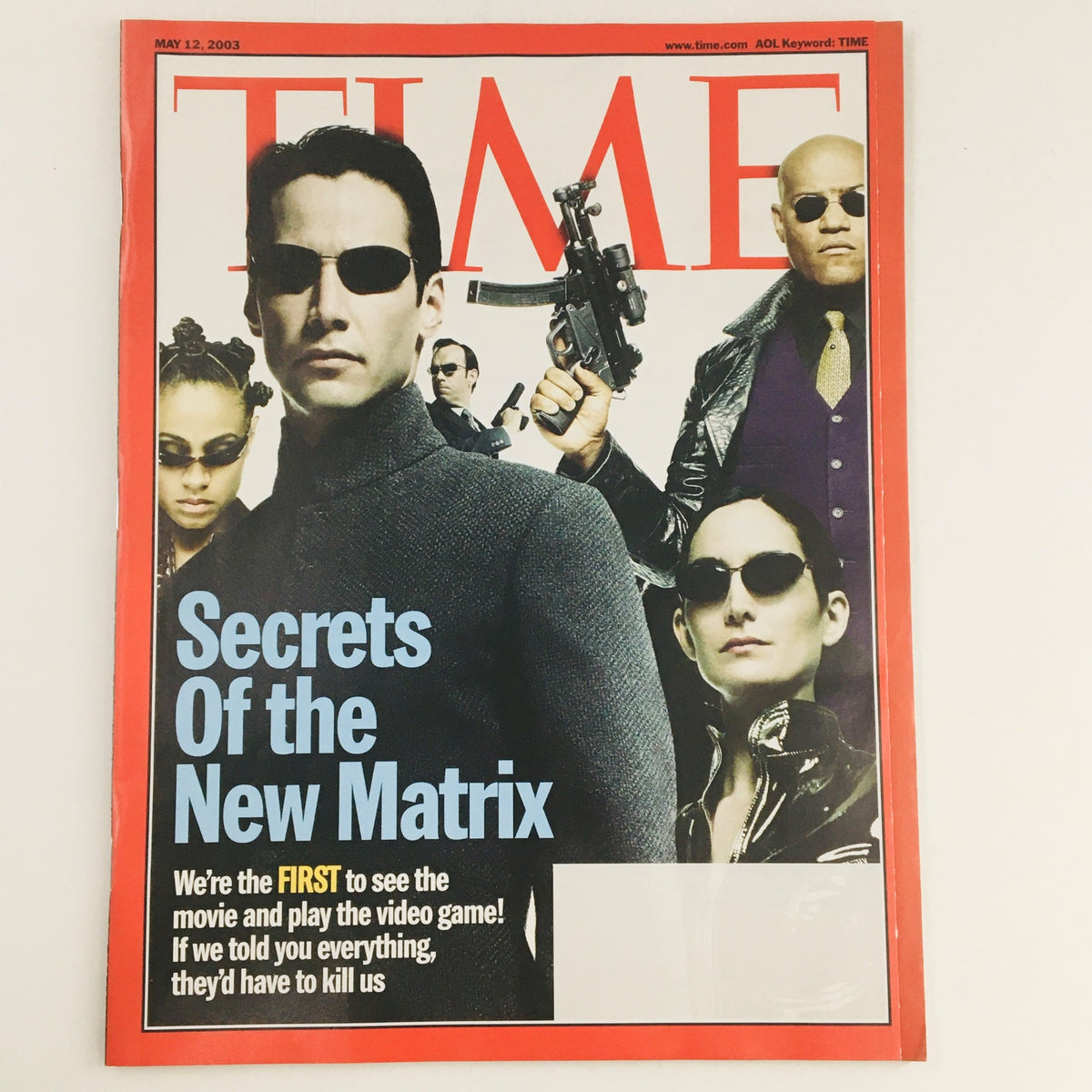 Time Magazine cover from May 12, 2003, featuring Keanu Reeves and the headline 'Secrets of the New Matrix'. This vintage magazine explores the cultural impact of 'The Matrix' film.