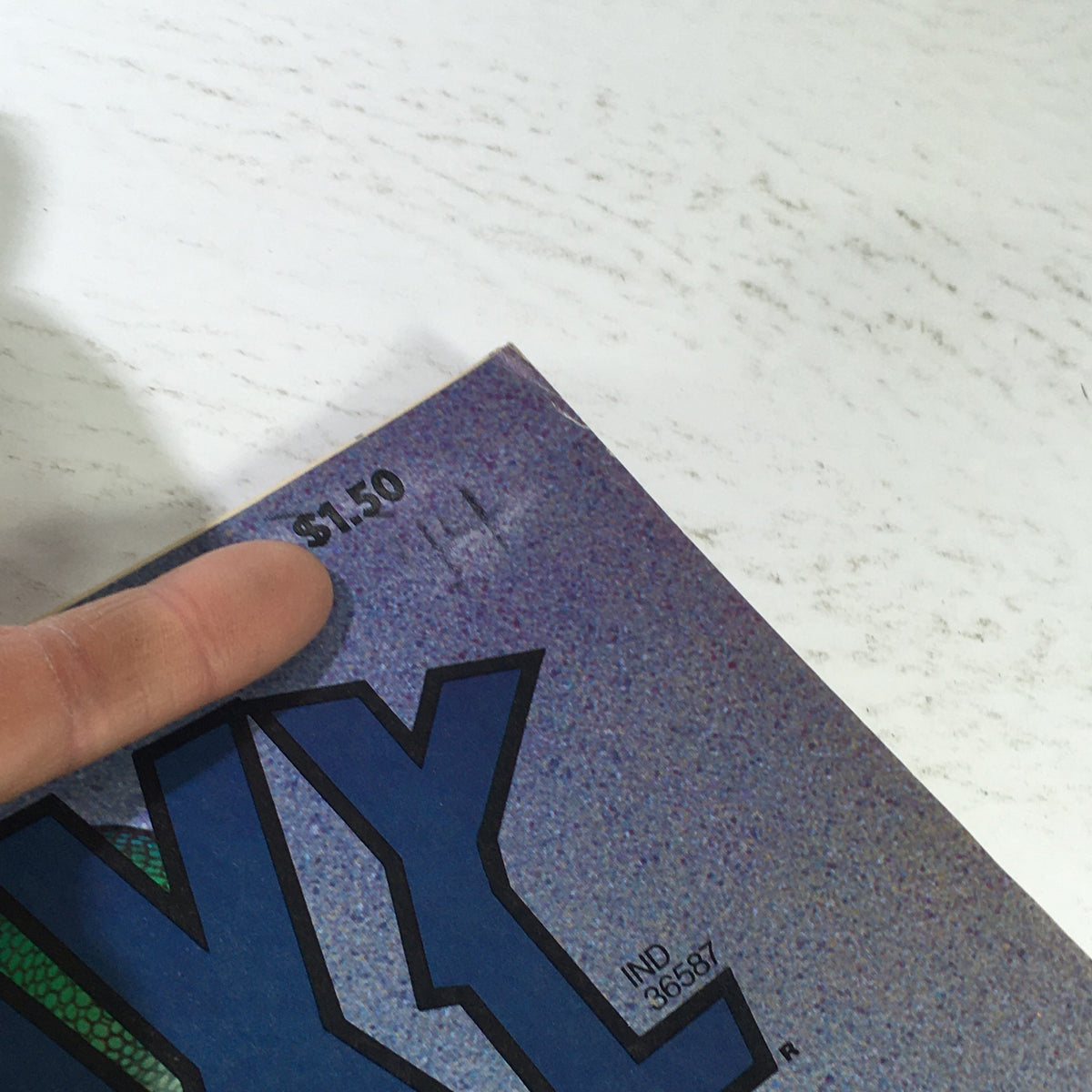 Close-up of the price tag on the VTG Heavy Metal Magazine July 1978, indicating a price of $1.50.