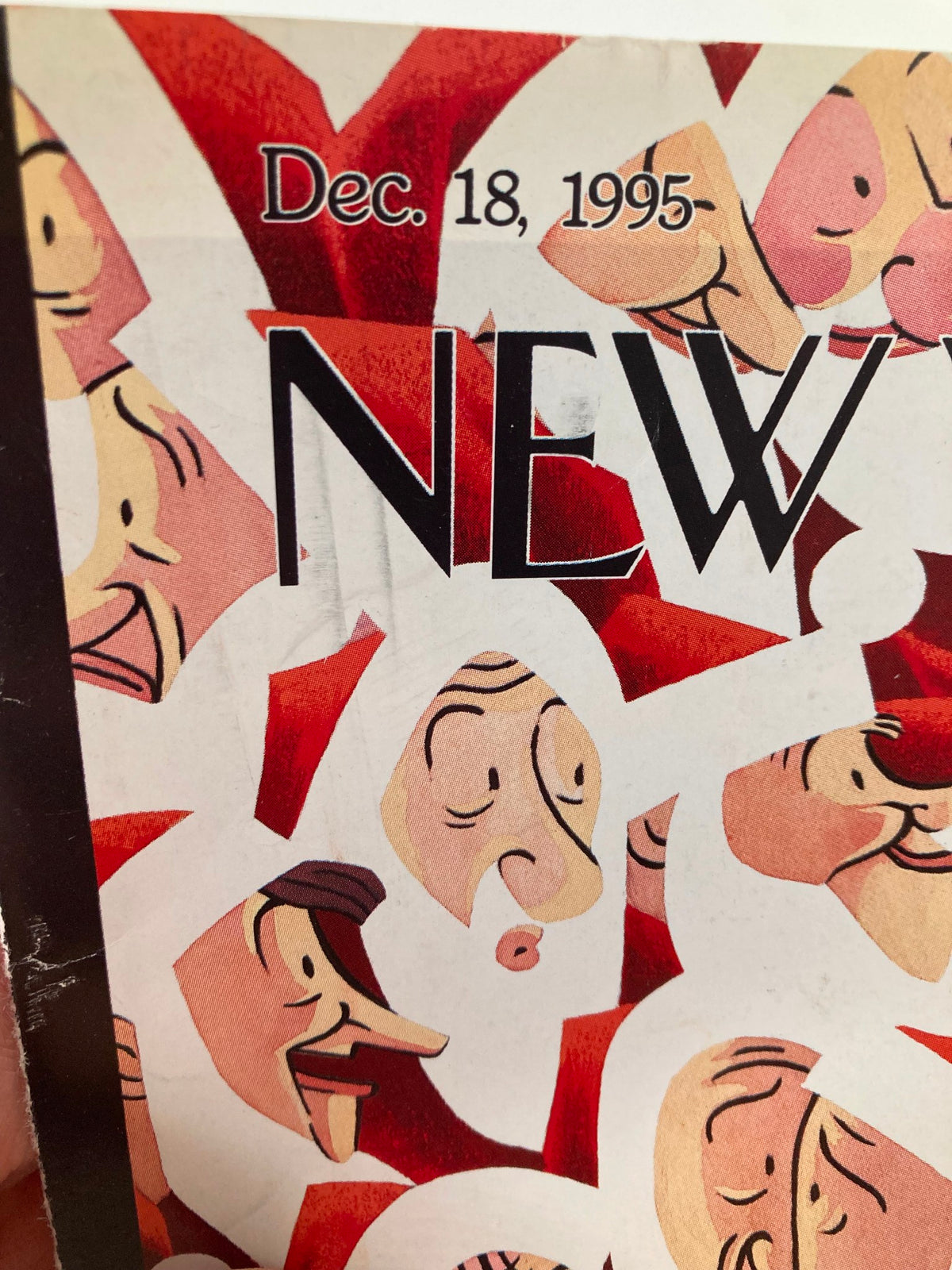 Detail of The New Yorker December 18, 1995 cover titled 'Santa City' by Max, featuring whimsical illustrations of Santa characters with bold typography.
