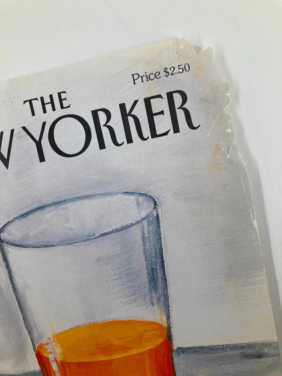 Close-up view of The New Yorker magazine cover from January 30, 1995, featuring a glass of orange juice with visible wear, titled 'A Bit of OJ To Start The Day'.