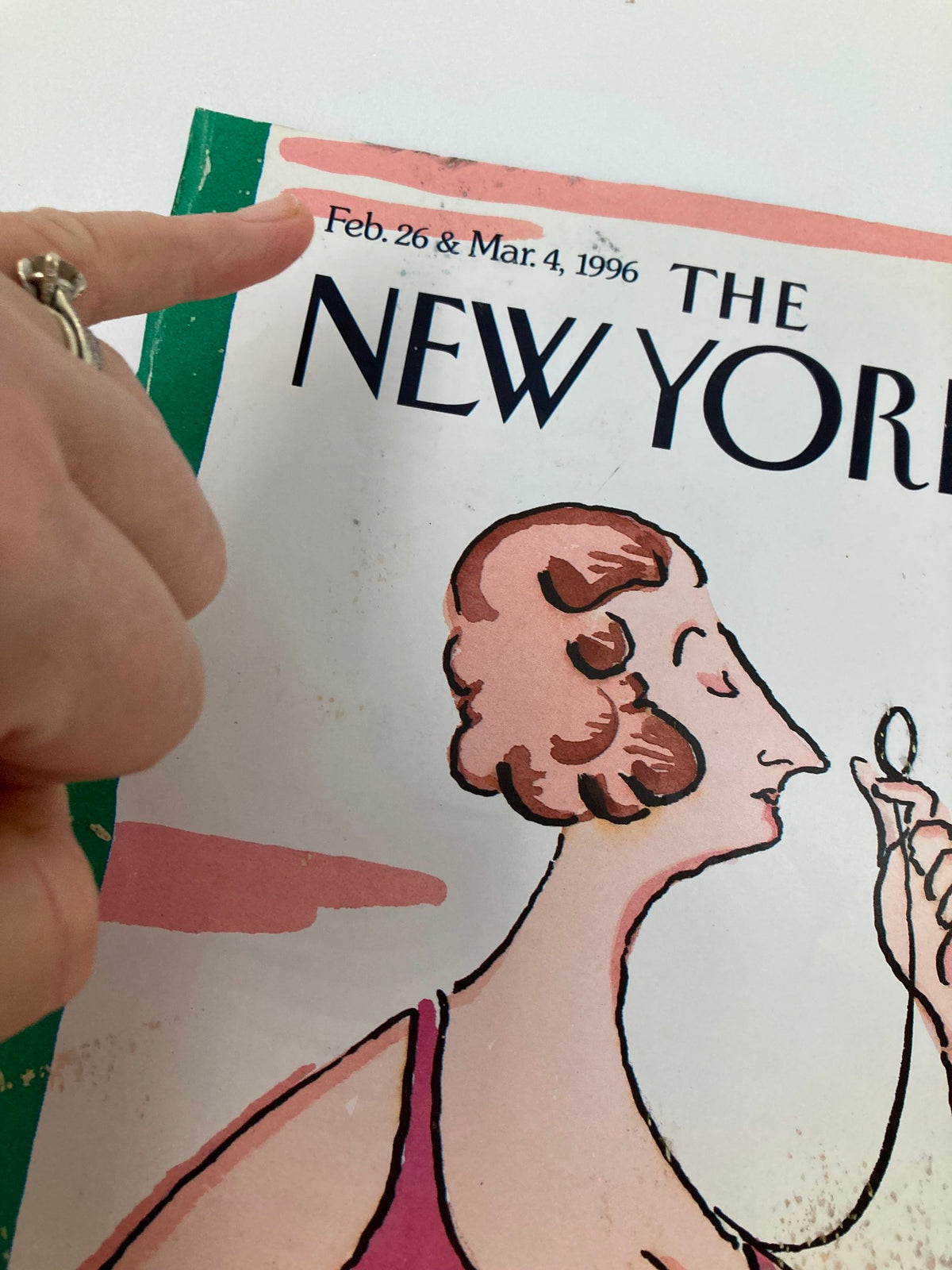 Close-up view of The New Yorker cover dated February 26 & Mar. 4, 1996, highlighting the date and design details.