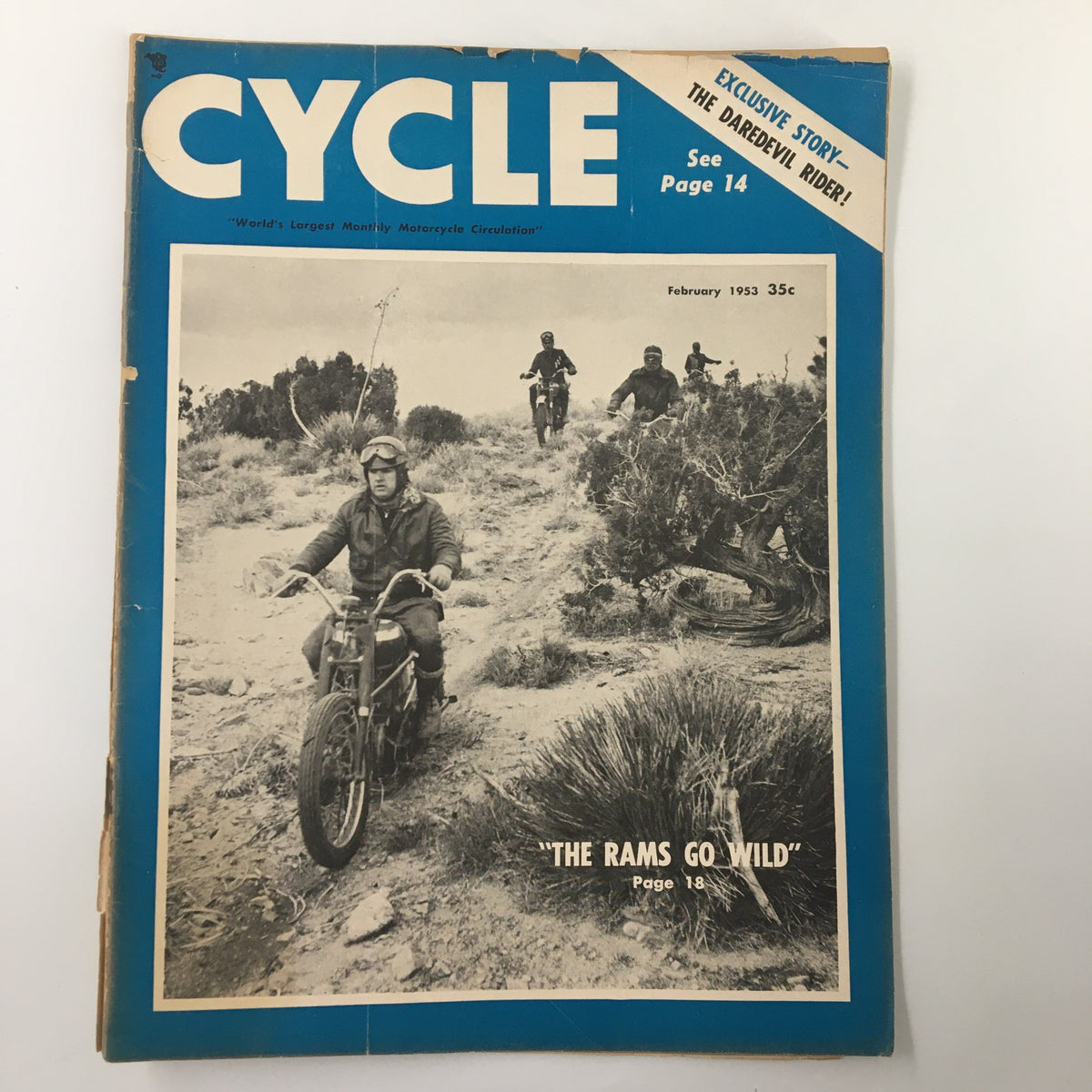 Cover of VTG Cycle Magazine February 1953 showcasing the title 'The Rams Go Wild' with riders on motorcycles in a rugged terrain.