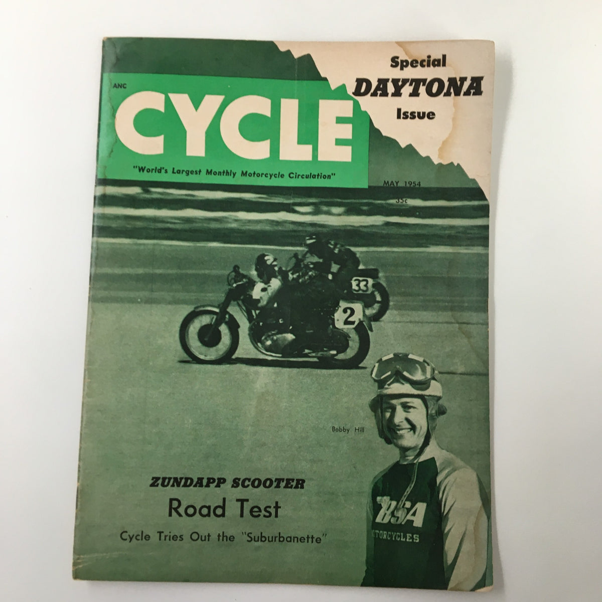 Cover of VTG Cycle Magazine May 1954 featuring a Zundapp Scooter road test by Bobby Hill, showcasing the vintage design and motorcycle culture of the era.