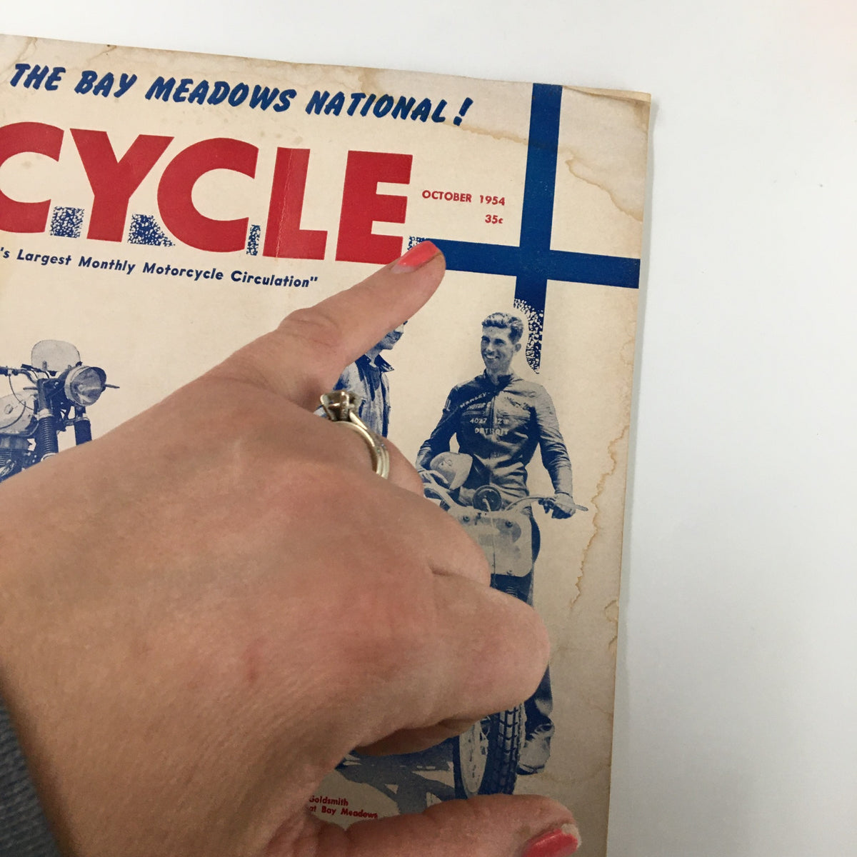 Cover of VTG Cycle Magazine October 1954 featuring Joe Leonard and Paul Goldsmith with a prominent title and vintage design elements.