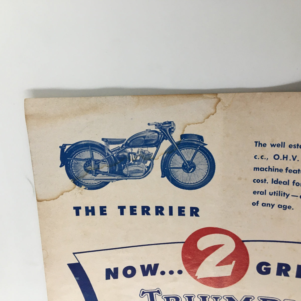 Interior page of the VTG Cycle Magazine October 1954 displaying an advertisement for a motorcycle, illustrating the era's marketing style and design.