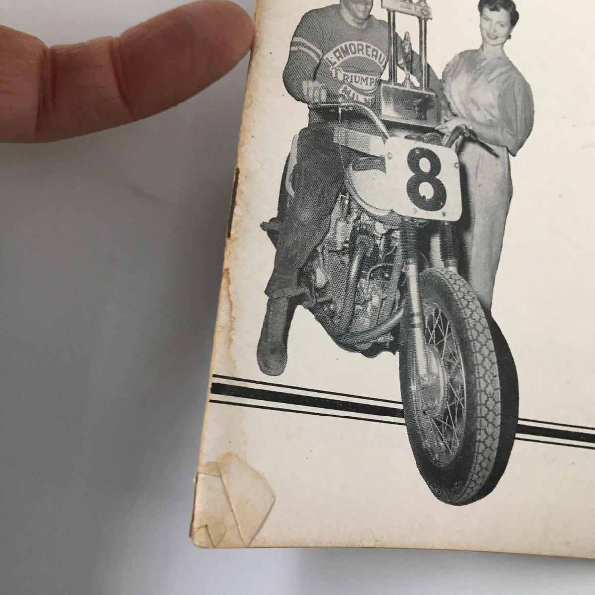 Front cover of VTG Cycle Magazine January 1955 featuring a male motorcyclist on a motorcycle with number 8 and a trophy, capturing the spirit of the Pacific Coast TT Championship.