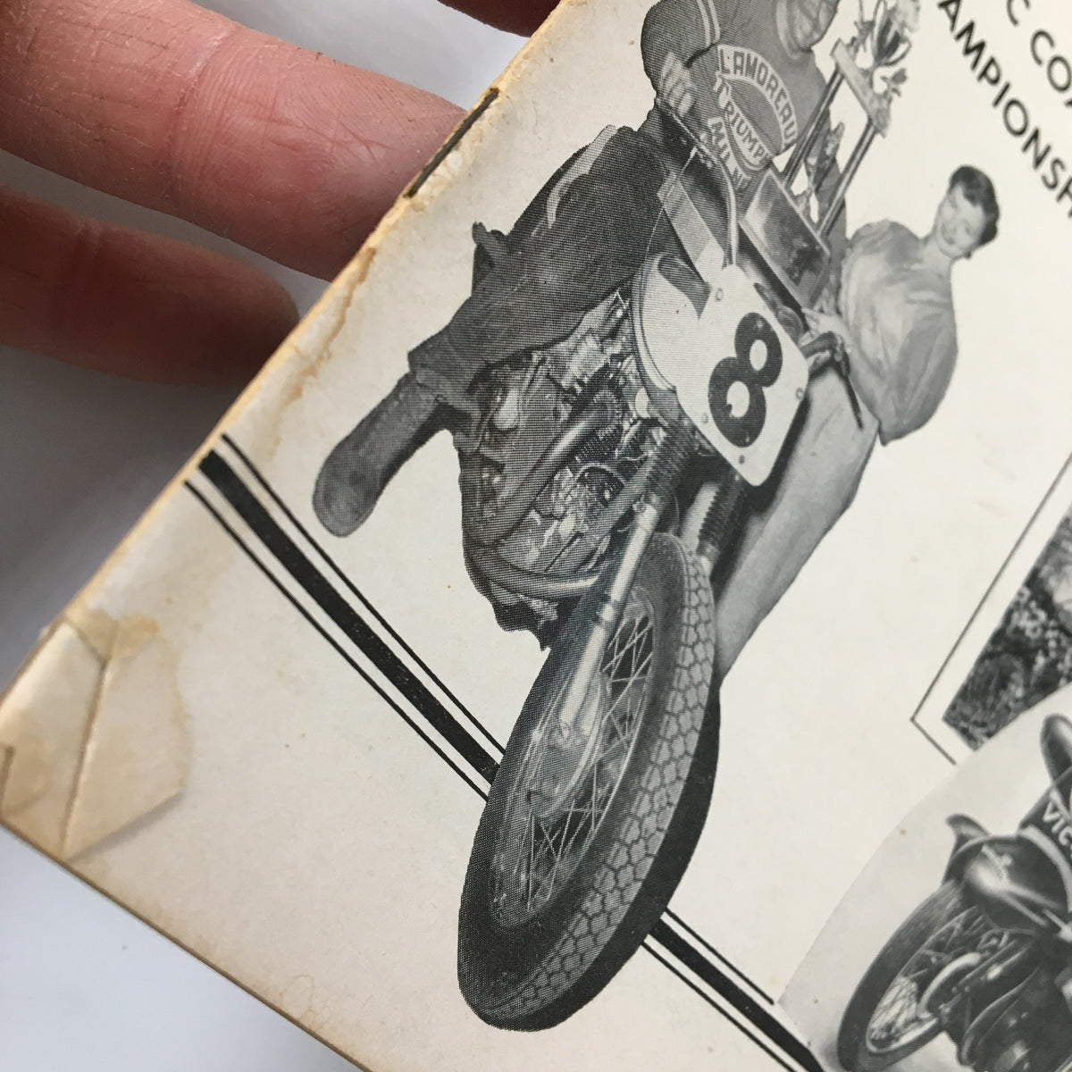 Detail of the front cover of VTG Cycle Magazine January 1955 showing a motorcyclist holding a trophy, highlighting the Pacific Coast TT Championship excitement.