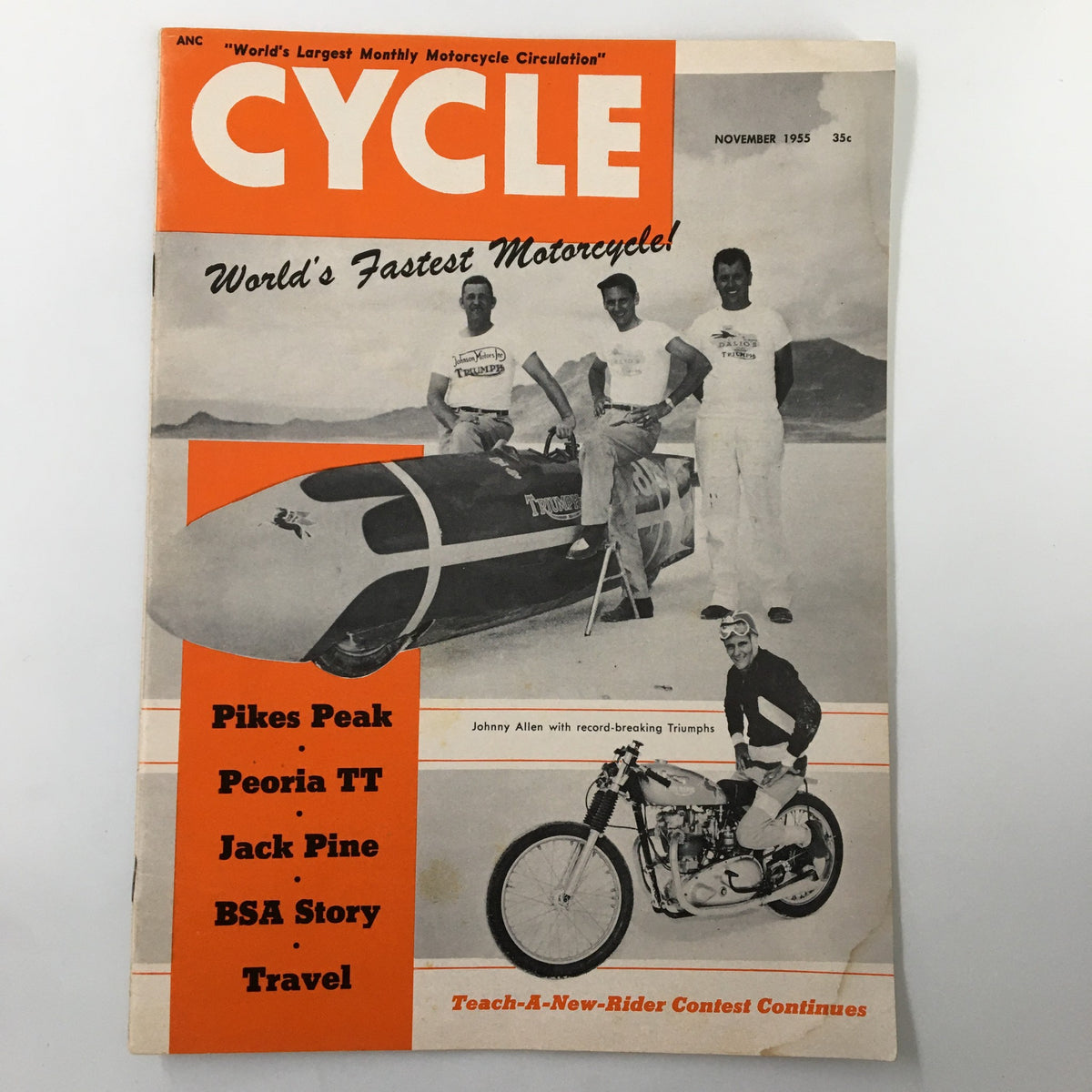 Cover of VTG Cycle Magazine November 1955 featuring Johnny Allen and record-breaking Triumph motorcycles. The cover highlights the world's fastest motorcycle and includes features on Pikes Peak and other motorcycle events.