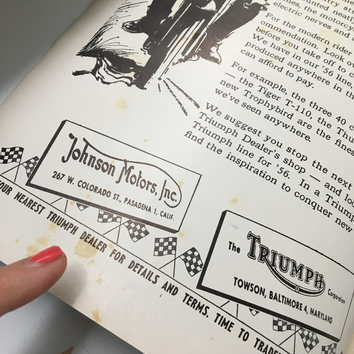 Close-up view of an advertisement from the VTG Cycle Magazine January 1956 for Johnson Motors, Inc. and The Triumph Corporation, showcasing vintage motorcycle promotions.